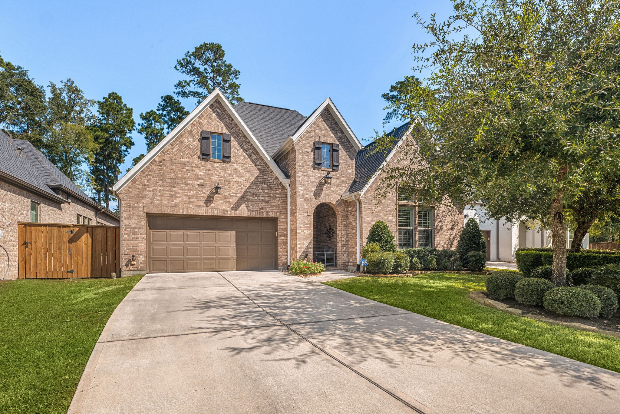 Welcome home to 139 Dawning Rays Court! Featuring beautiful brick architecture, mature trees, lush landscaping, and inviting curb appeal in the heart of Grand Central Park!