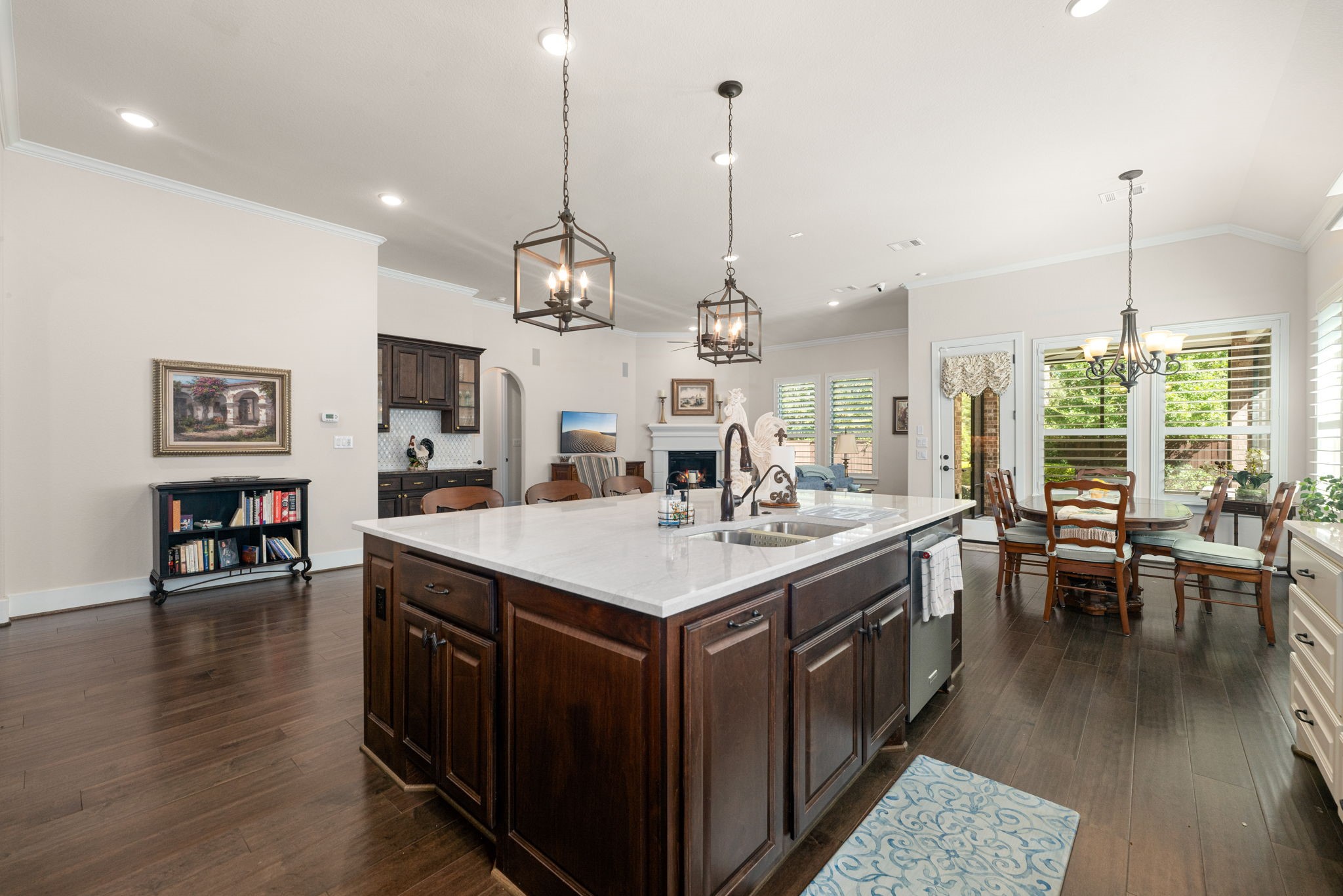 The heart of the home! This open-concept design seamlessly connects the gorgeous kitchen, spacious living area, and dining space, making everyday living and entertaining a breeze!