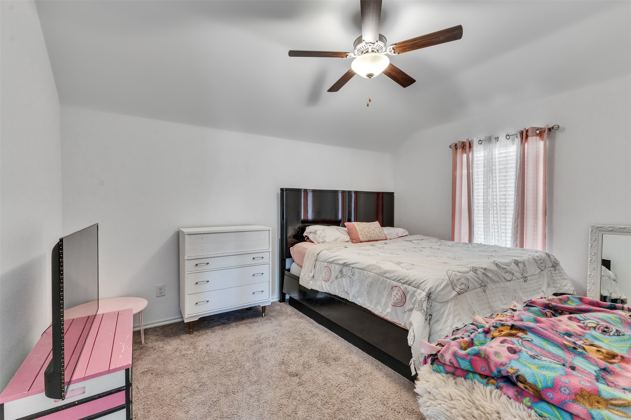 This secondary bedroom is home to a king size bed!