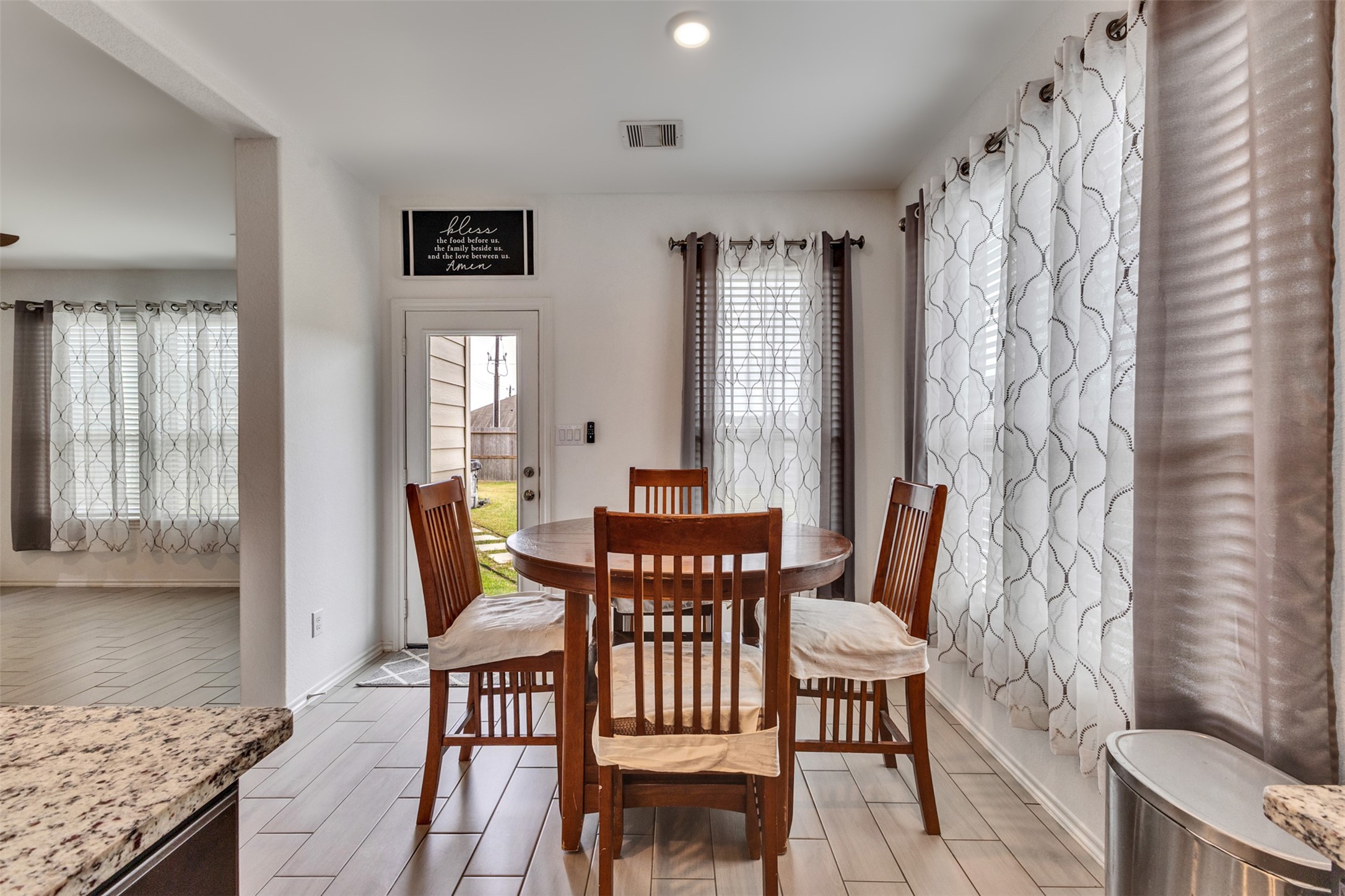 The delightful breakfast room offers a place for casual meals.