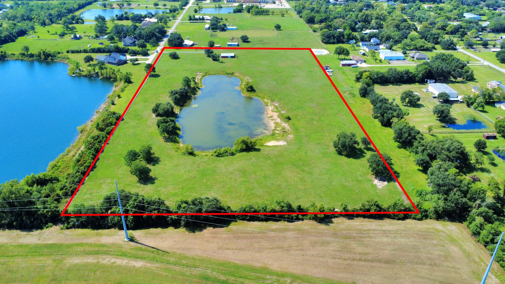 Property line in red is not the exact property boundary line, It is showing what the seller iis currently using including the R.O.W. Buyer to verify property boundary lines.