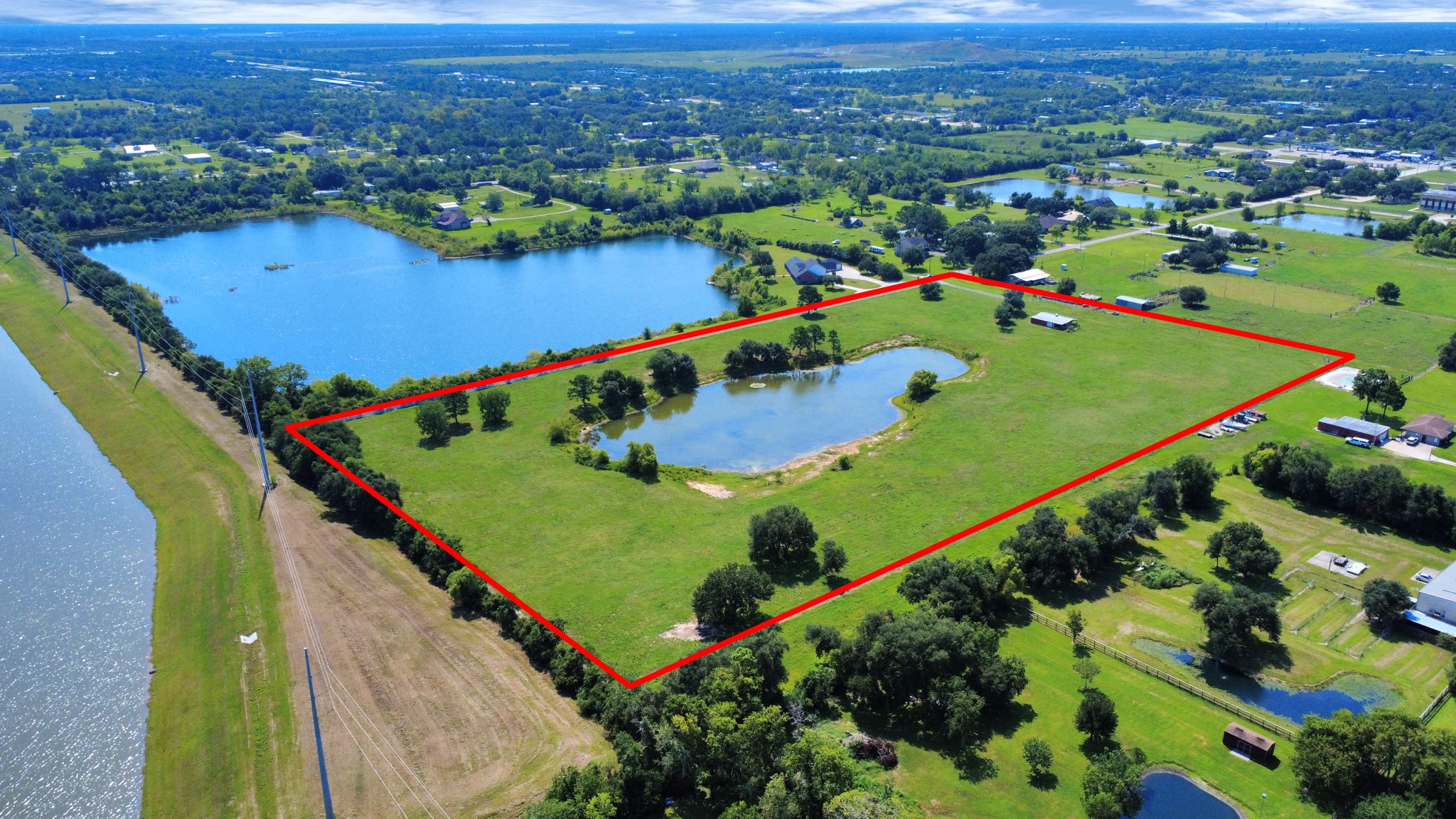 Property line in red is not the exact property boundary line, It is showing what the seller iis currently using including the R.O.W. Buyer to verify property boundary lines.