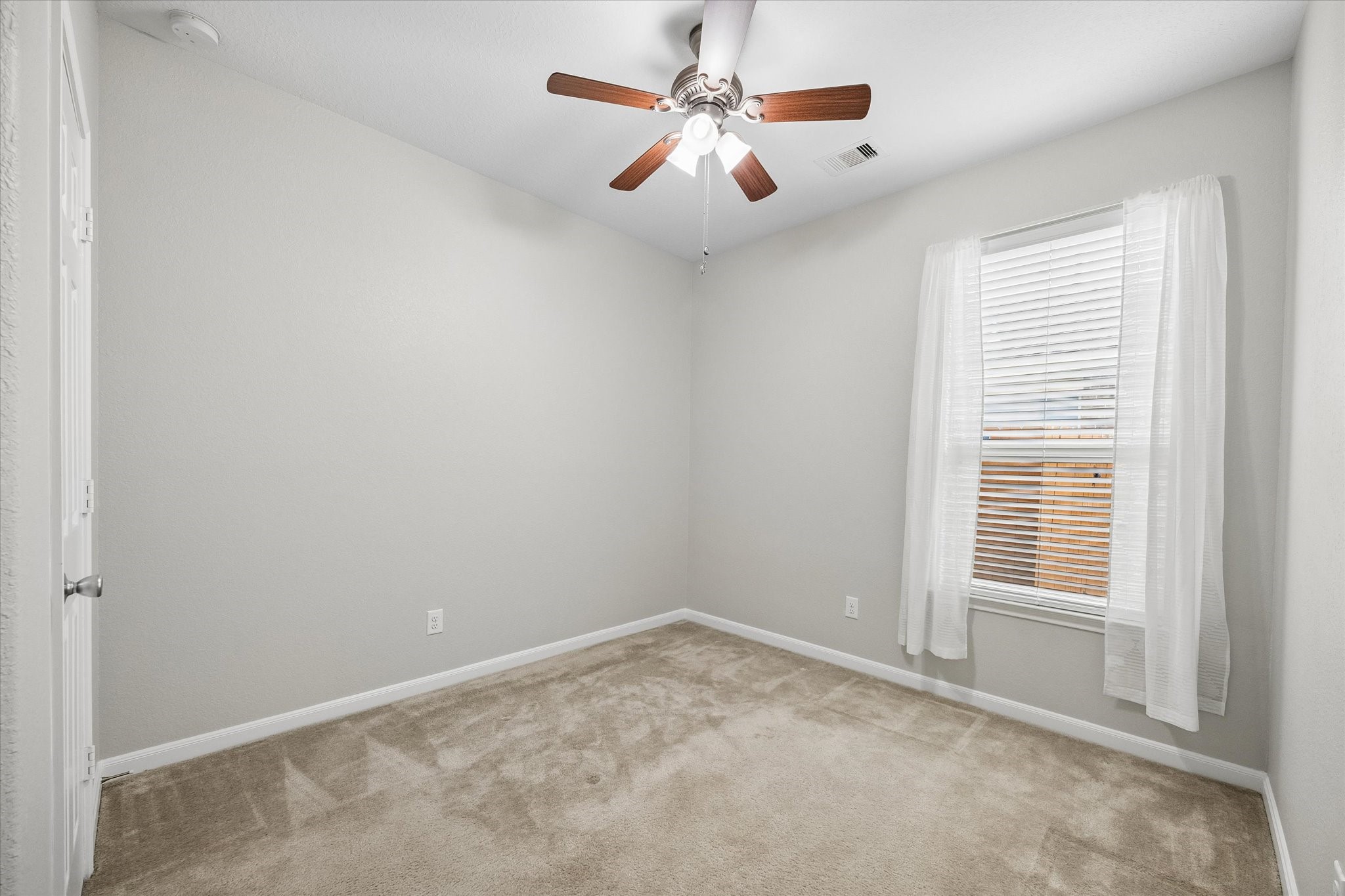 A versatile space for guests, a home office, or hobbies.