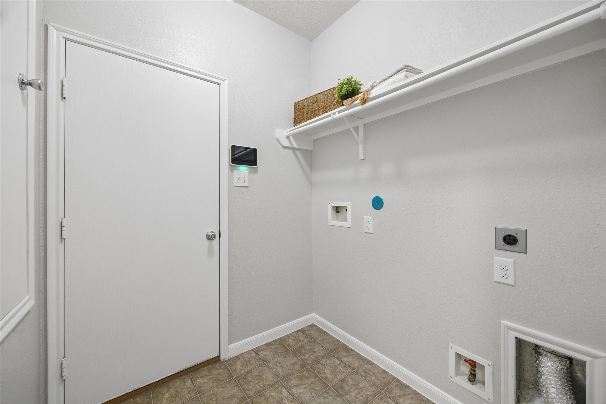 Dedicated laundry room with convenient access from the attached garage.
