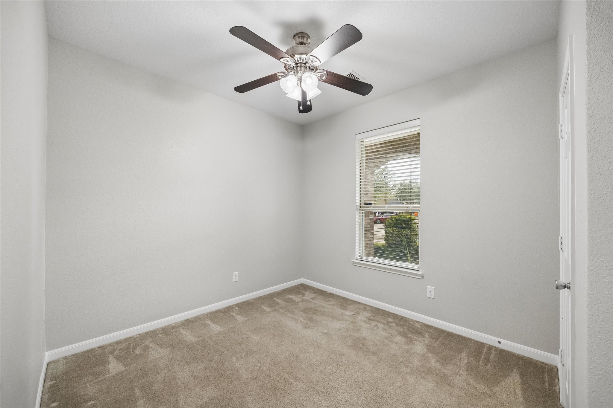 Comfortable secondary bedroom with room to make it your own.
