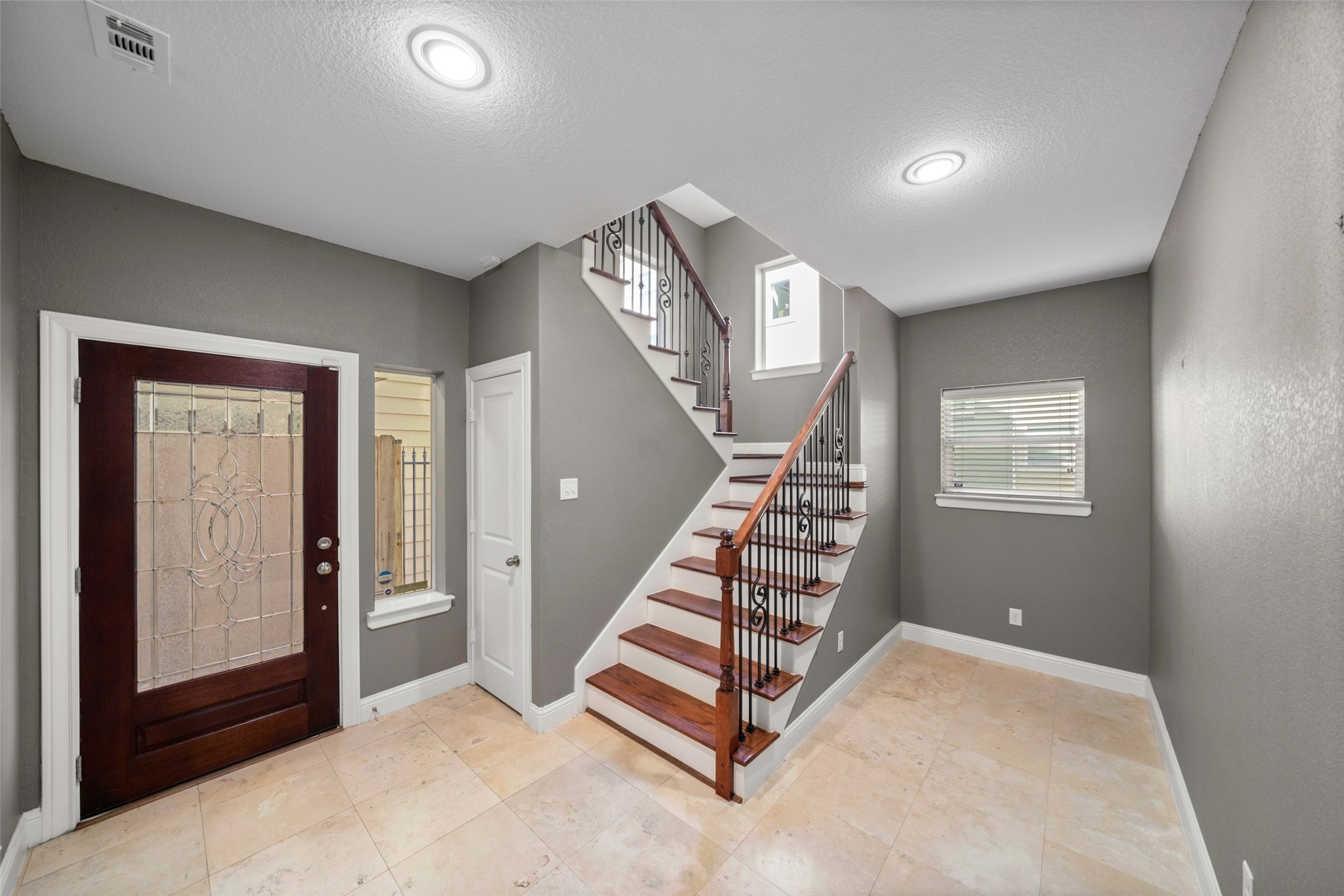 Front entry with bonus area for a desk or workout space Front entry with bonus area for a desk or workout space