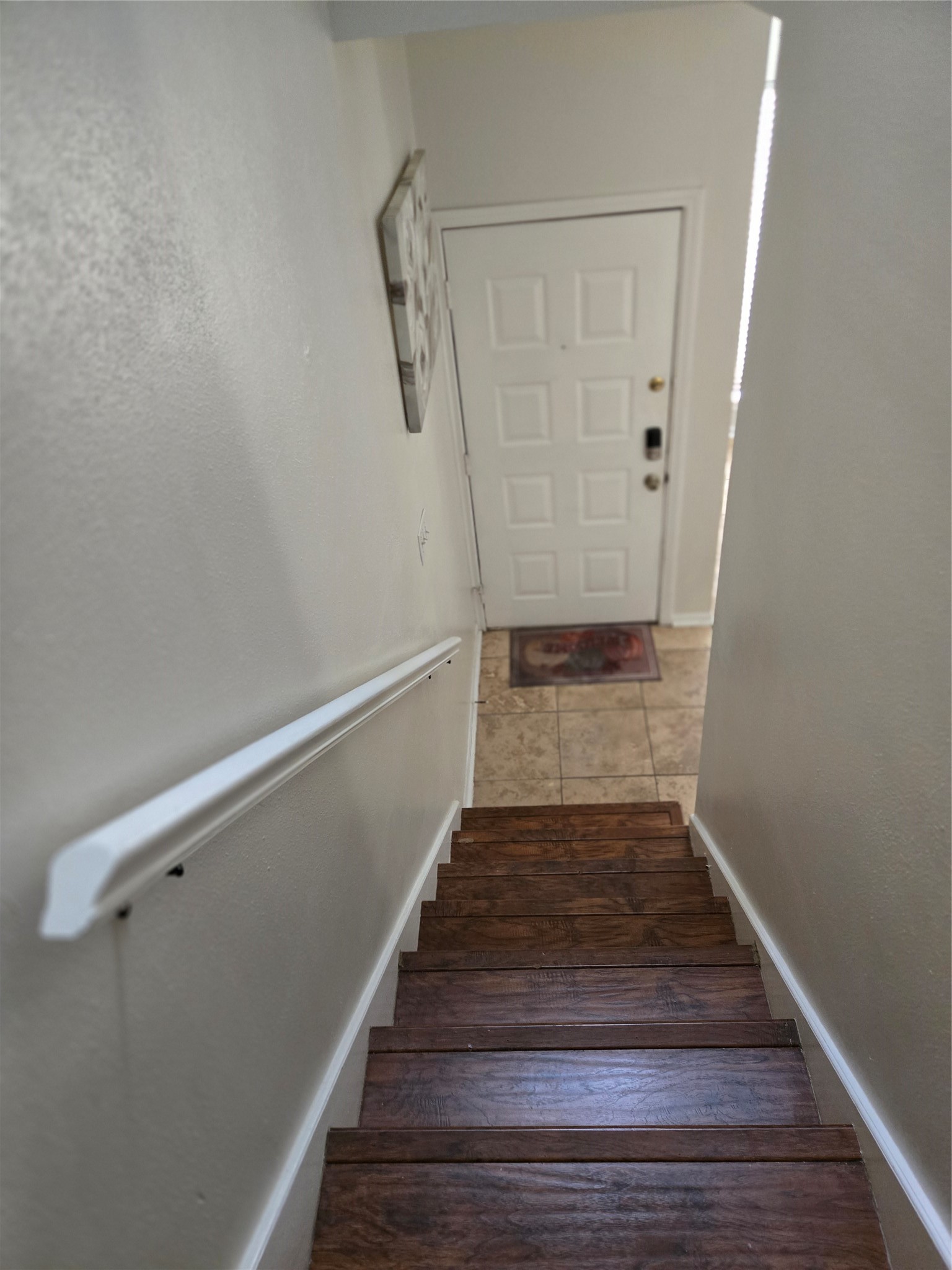 Stairwell down to Exit Door, Living/Dining area