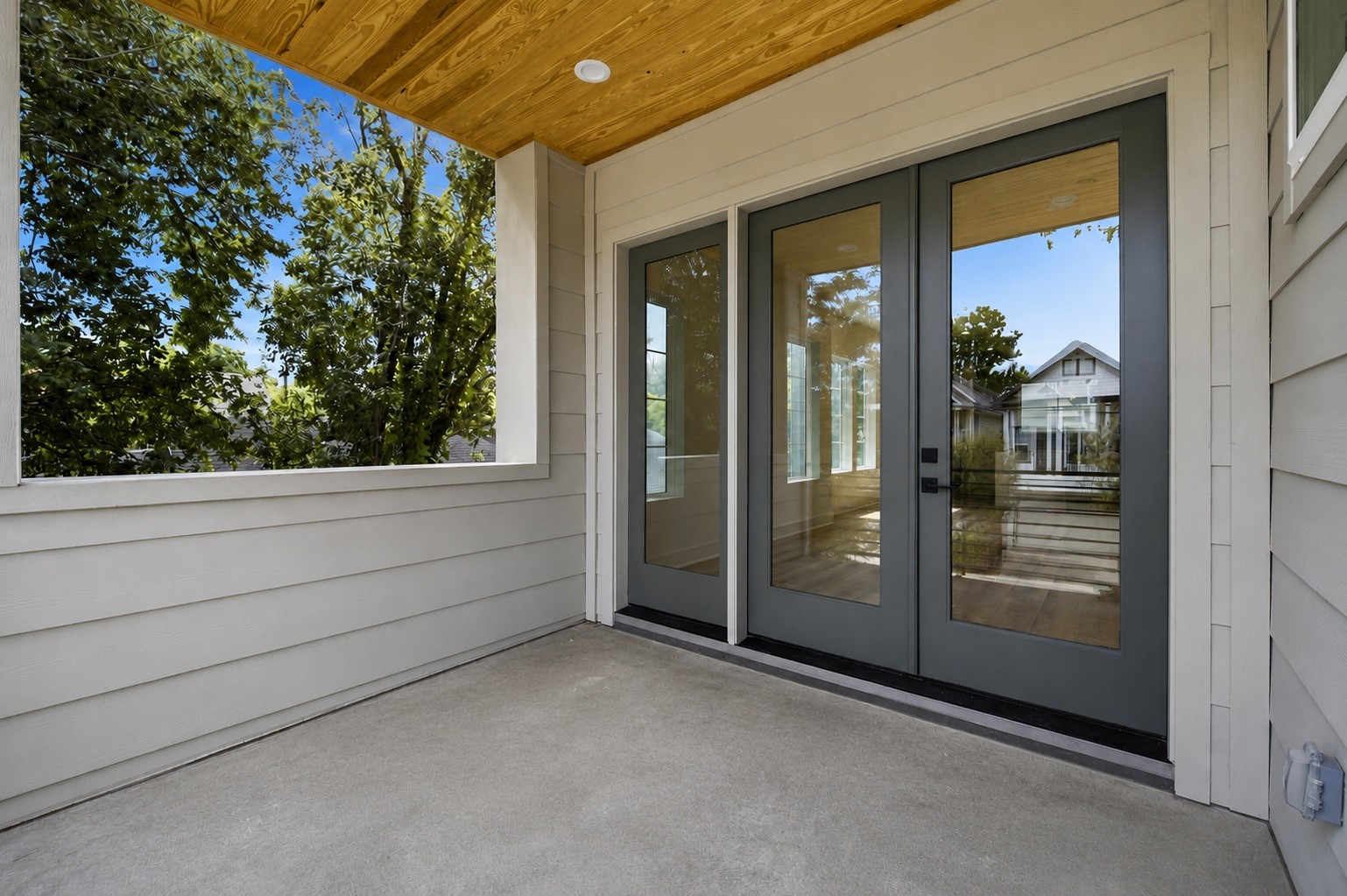 Large 7 ft x 11 ft covered balcony, perfect for entertaining.