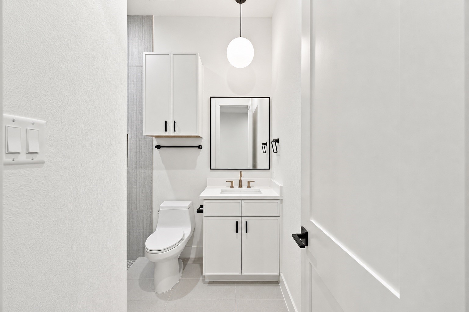 Vanity for bathroom on the first floor.