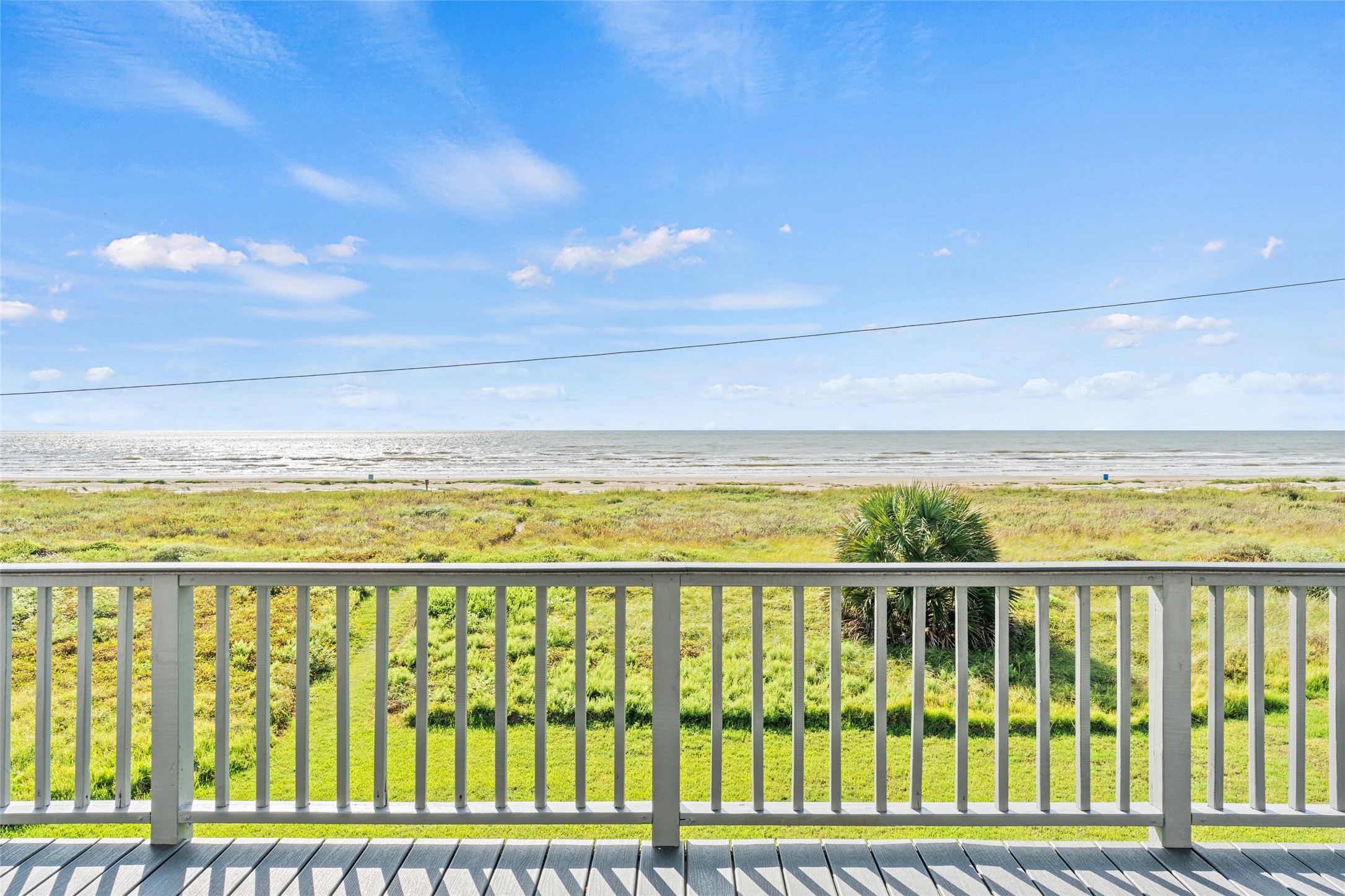 Breathtaking ocean views from the spacious deck are perfect for relaxation.