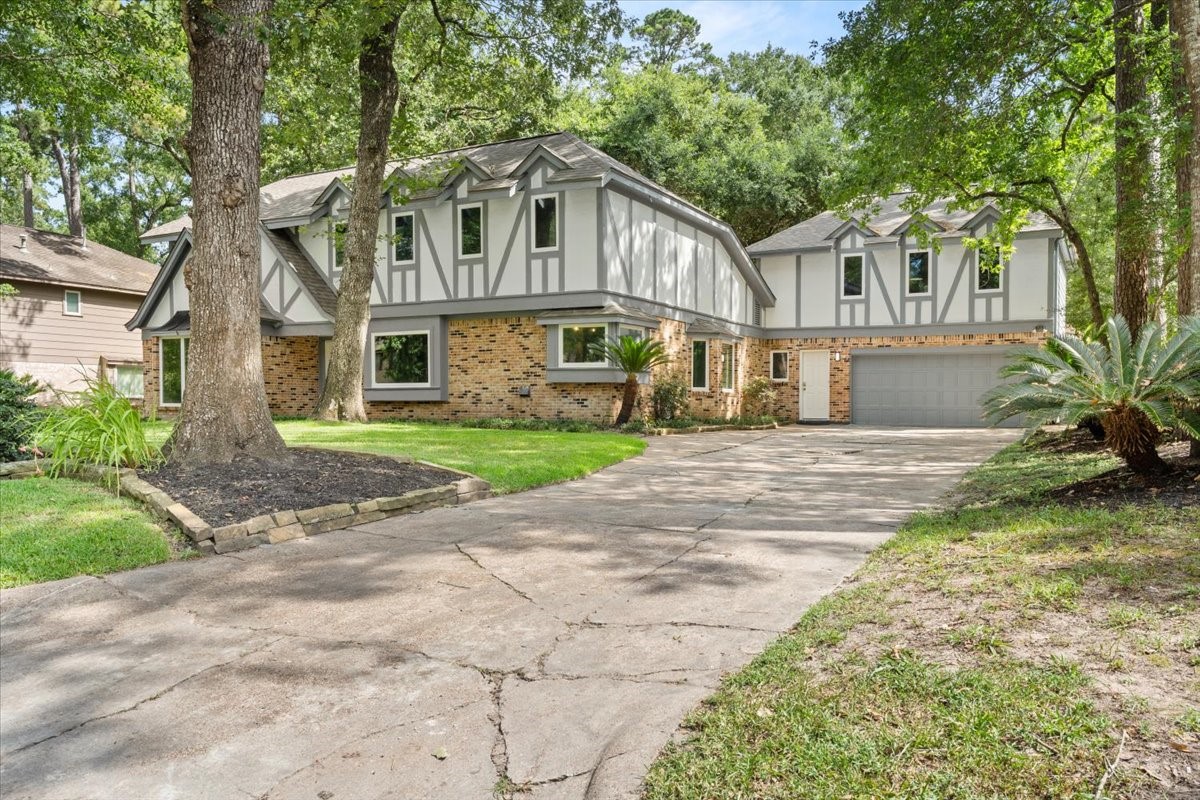 This home features a three car garage with extra storage space and a widened driveway.