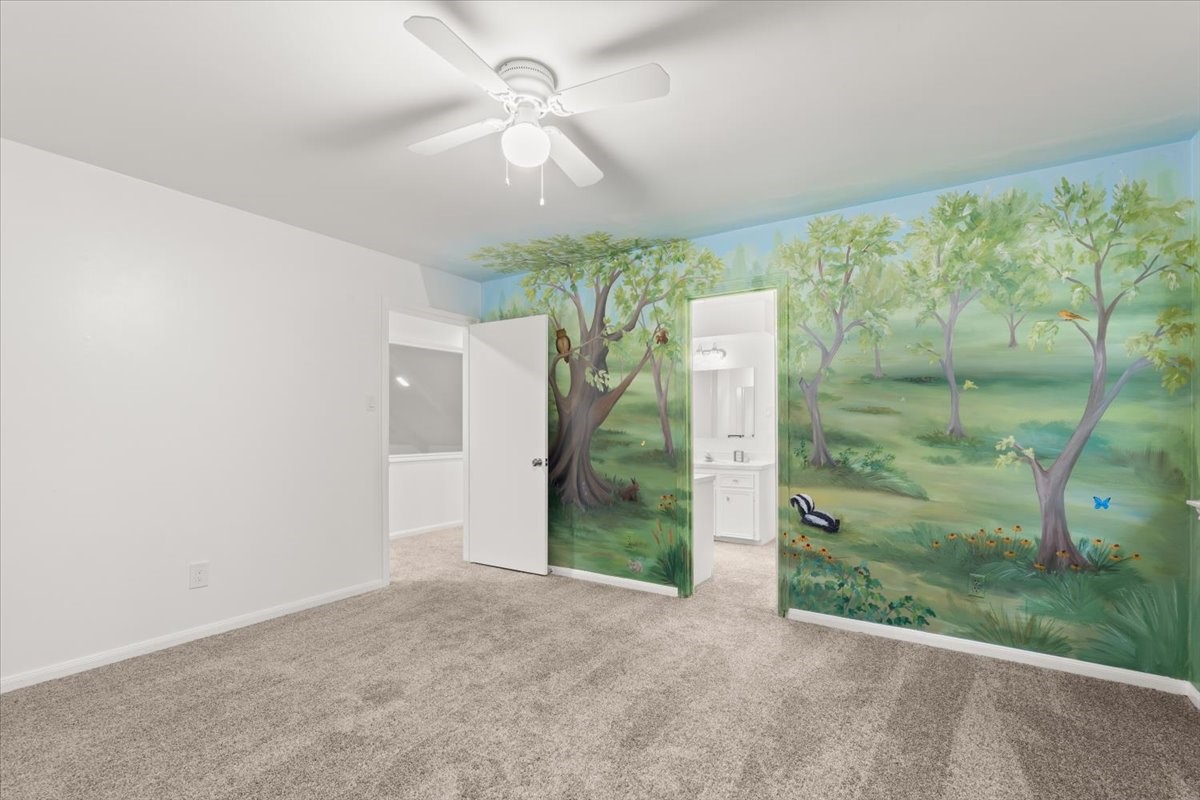 Bedroom 4 has a designer wall that you can enjoy or paint the color of your choosing.