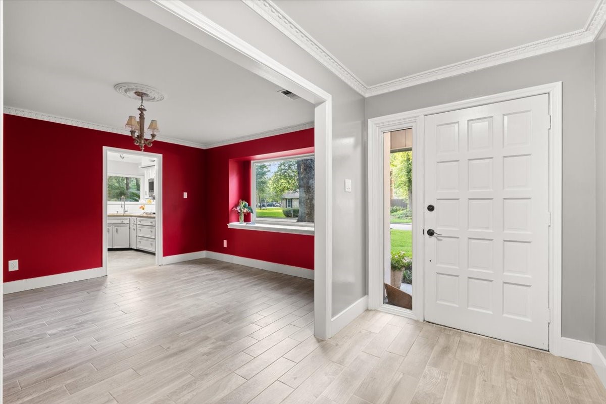 Step into elegance with this stunning entrance,
featuring vibrant red accents and sleek flooring.
Your dream home awaits!