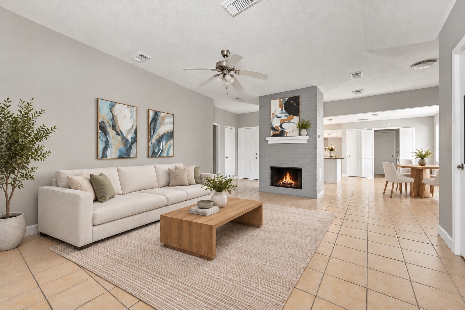 Virtual Staging- Living room: The bright and spacious living room seamlessly connects to the kitchen and dining area