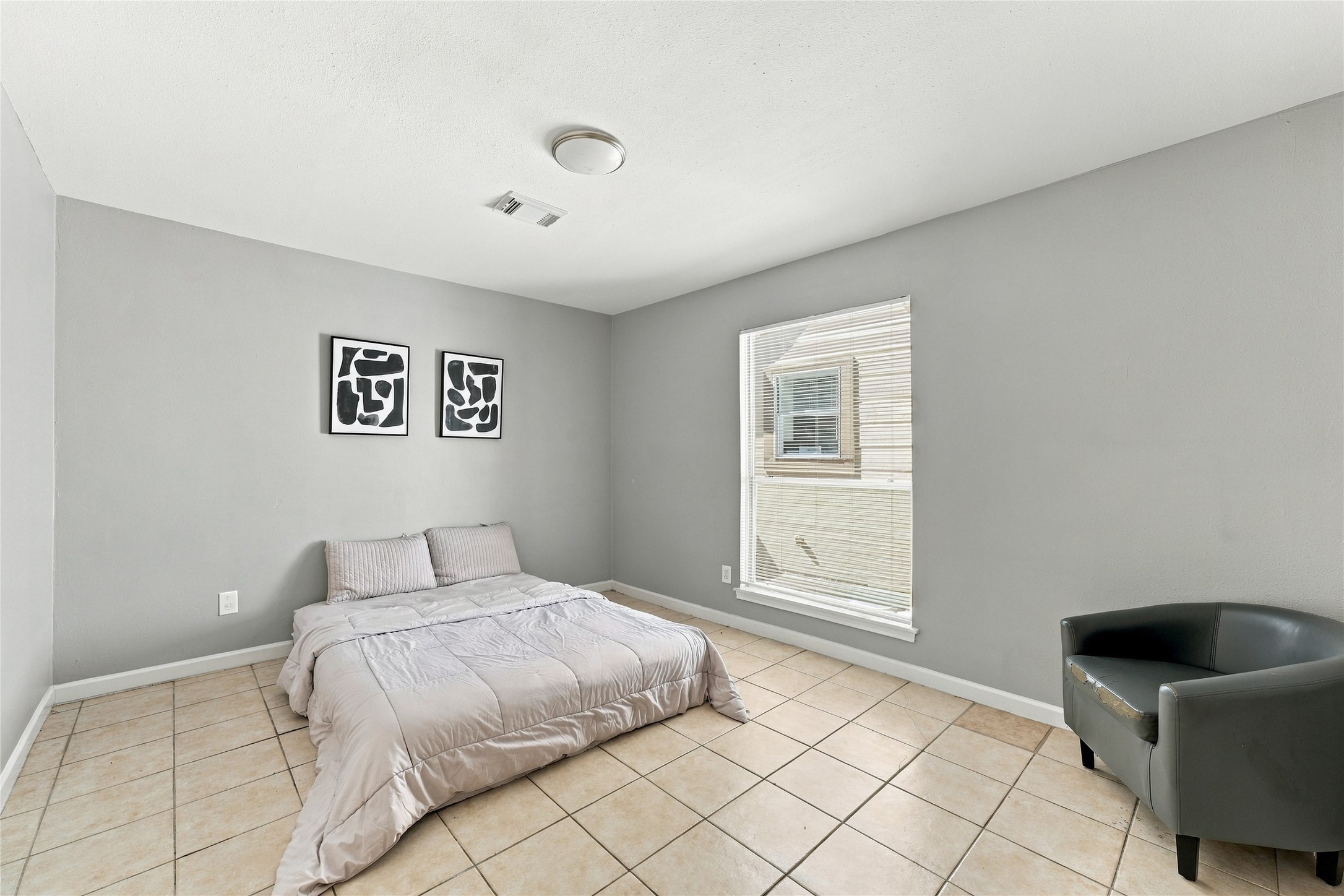 Secondary bedrooms are generously sized for comfort and versatility.
