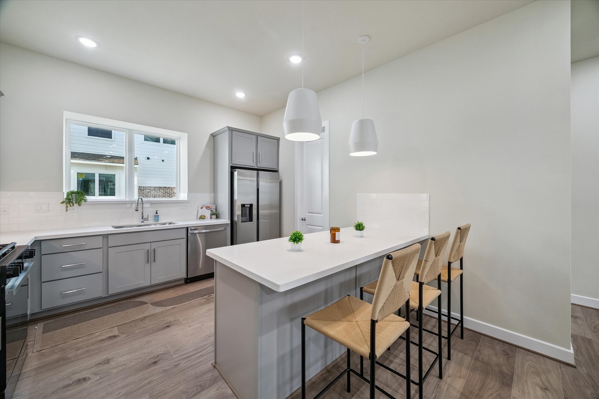 Representative photo showing the communitys model home kitchen. Layout and selections may vary.