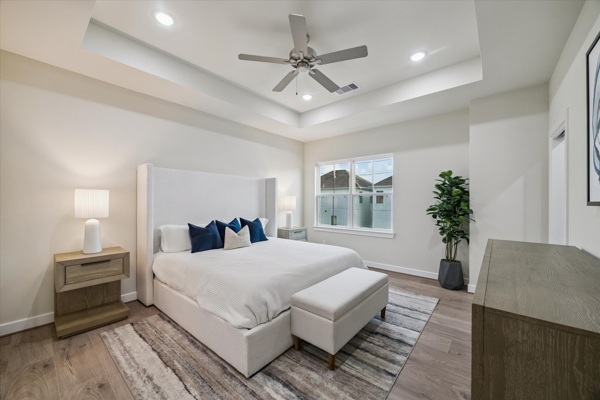 Representative photo showing the communitys model home primary bedroom. Layout and selections may vary.