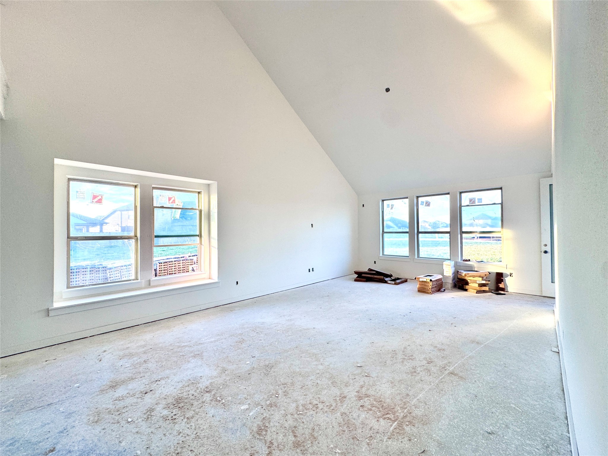Ceilings as tall as the sky...if the sky is 19ft! And yes, that's a built in bench in the dining room!