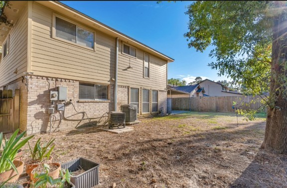 Spacious backyard, ideal for family gatherings, outdoor entertaining, barbecues, and creating lasting memories with family and friends.