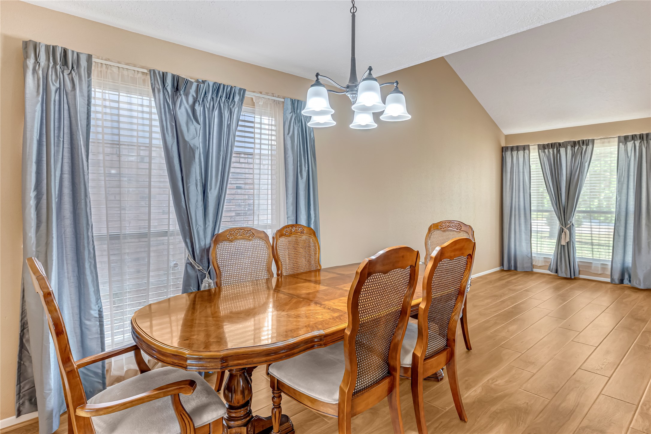 This elegant formal dining space offers a warm and inviting setting for your loved ones to gather, share meals, and create unforgettable memories. Whether hosting special occasions or enjoying everyday moments together, this space provides the perfect backdrop for connection, conversation, and lasting memories. This elegant formal dining space offers a warm and inviting setting for your loved ones to gather, share meals, and create unforgettable memories. Whether hosting special occasions or enjoying everyday moments together, this space provides the perfect backdrop for connection, conversation, and lasting memories.