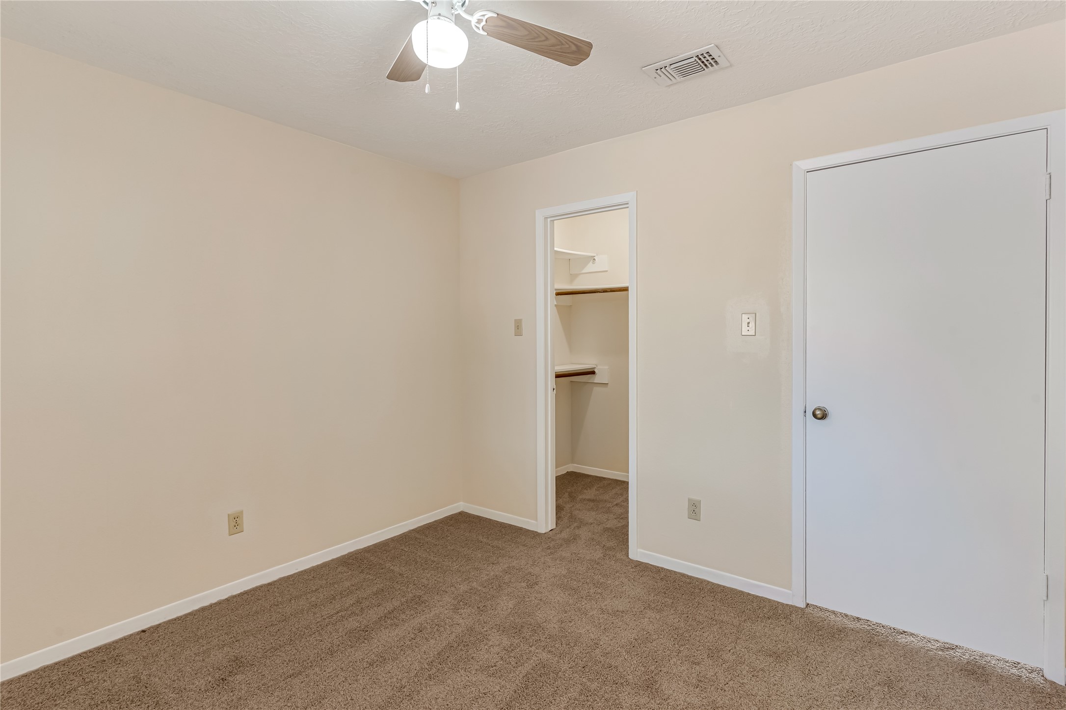 All guest bedrooms offer generous space and walk-in closets, providing comfort, functionality, and plenty of storage. Fresh paint, new carpet, and updated light fixtures give each room a clean, refreshed feel. These inviting spaces are ready to accommodate your lifestyle, whether you need restful retreats, guest accommodations, or a home office.