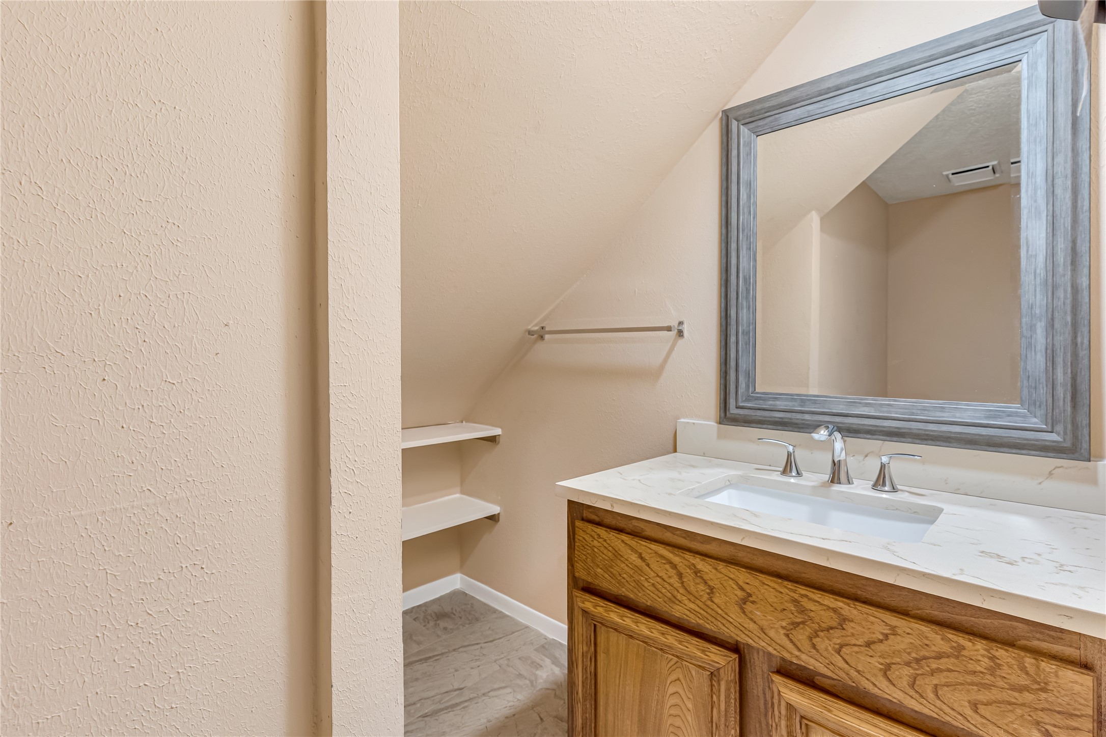 Downstairs Full bathroom - storage area.