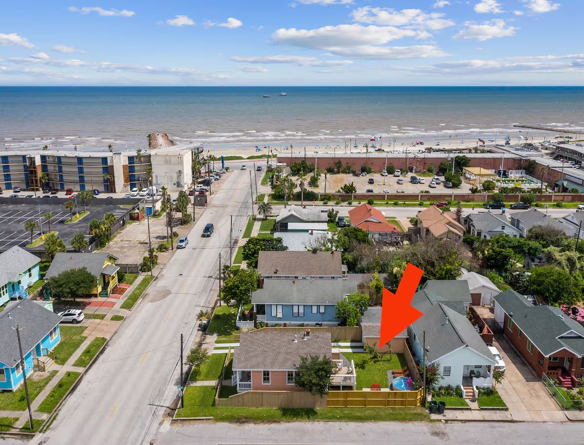 Aerial view of the home on a corner lot and walking distance to the beach and restaurants