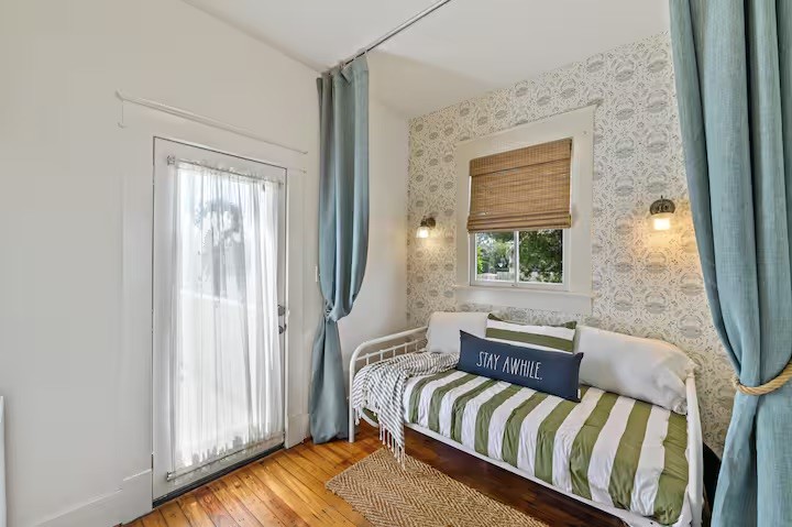 An additional twin sleeping area provides extra flexibility for guests.