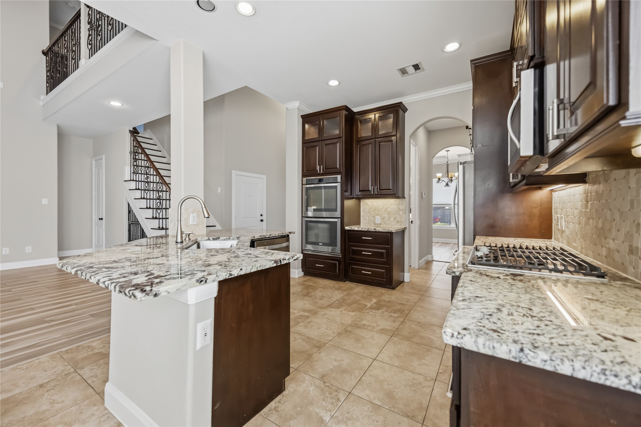 Equipped with plenty of cabinets and shelves for storage.