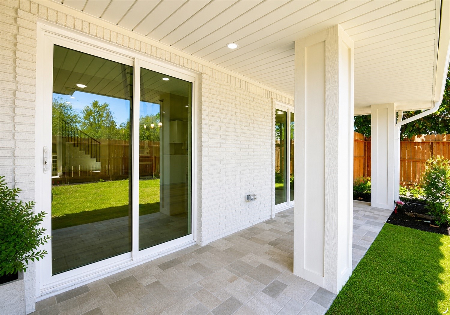 Covered patio located off the living area, creating a comfortable outdoor extension of the home