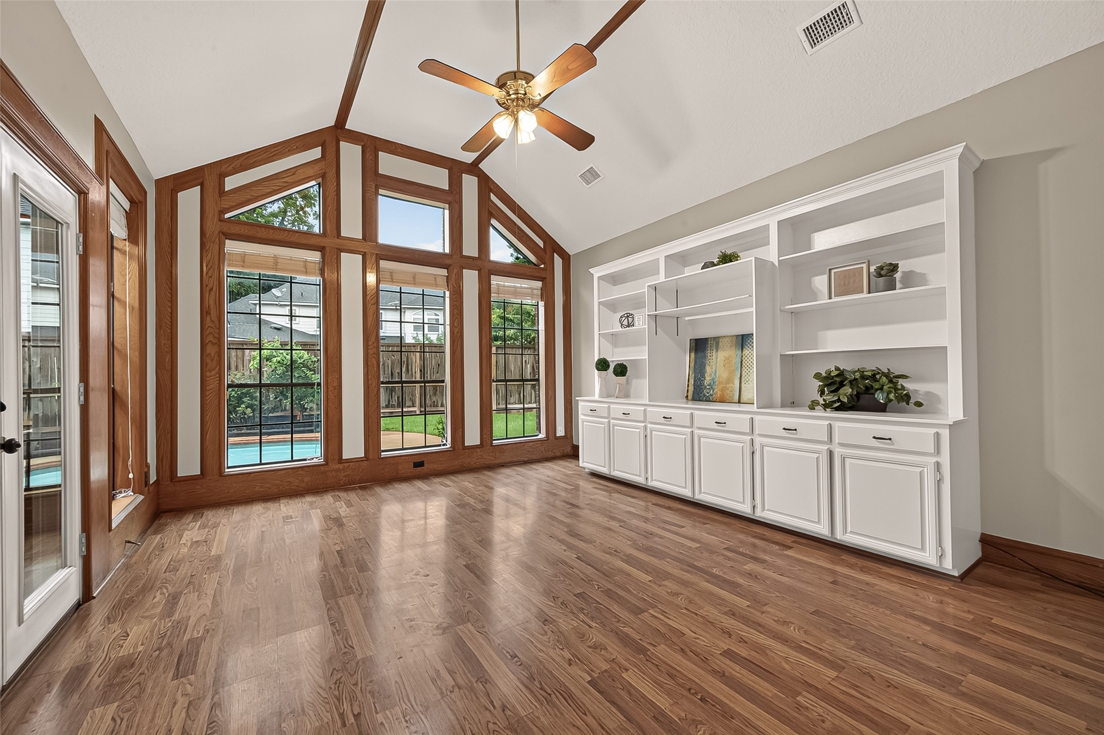 This large space known as the sun room can also be used as a secondary family room, or an at home office!
