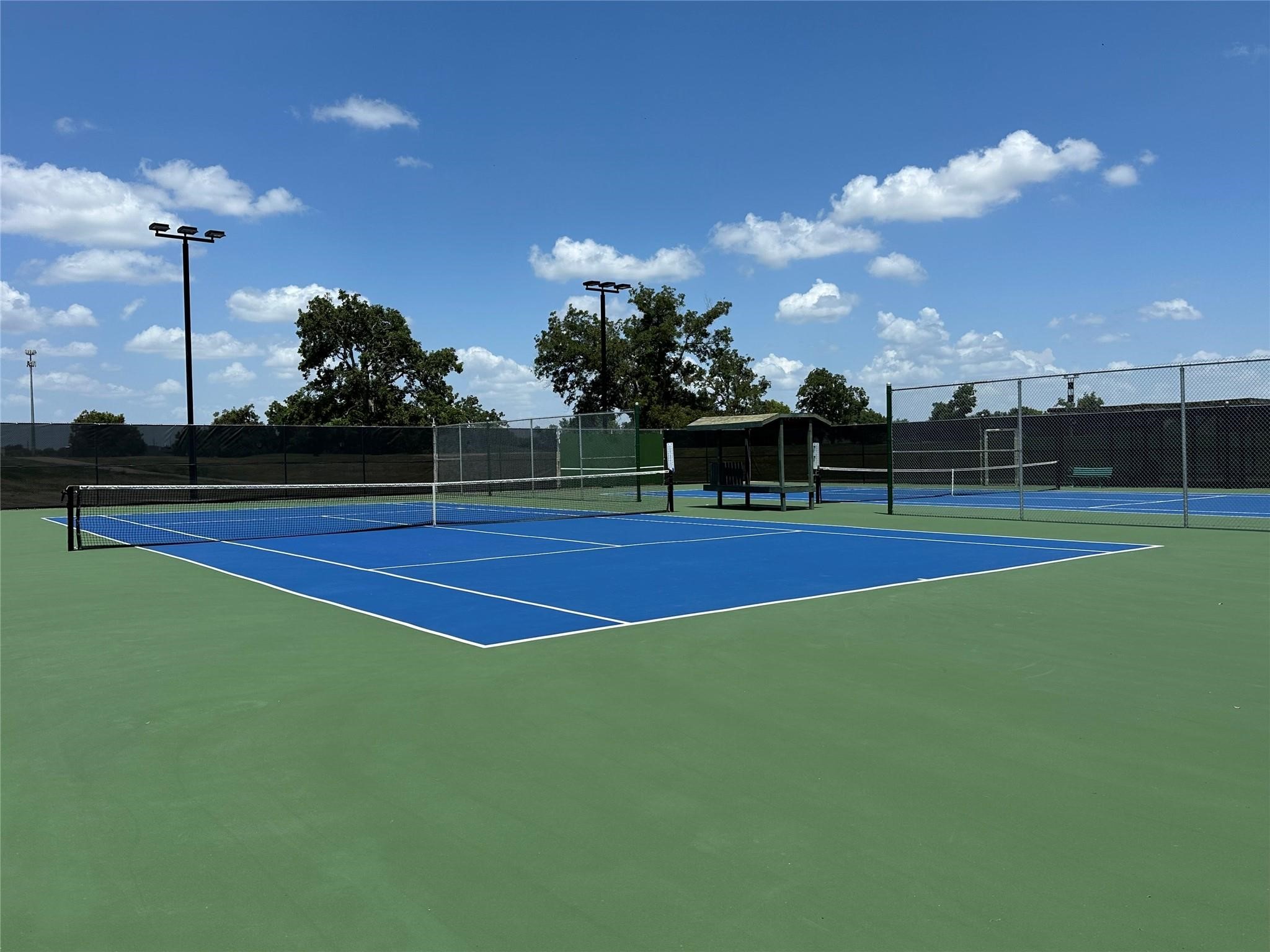 Subdivision Amenities include this Tennis Court/Pickleball court!
