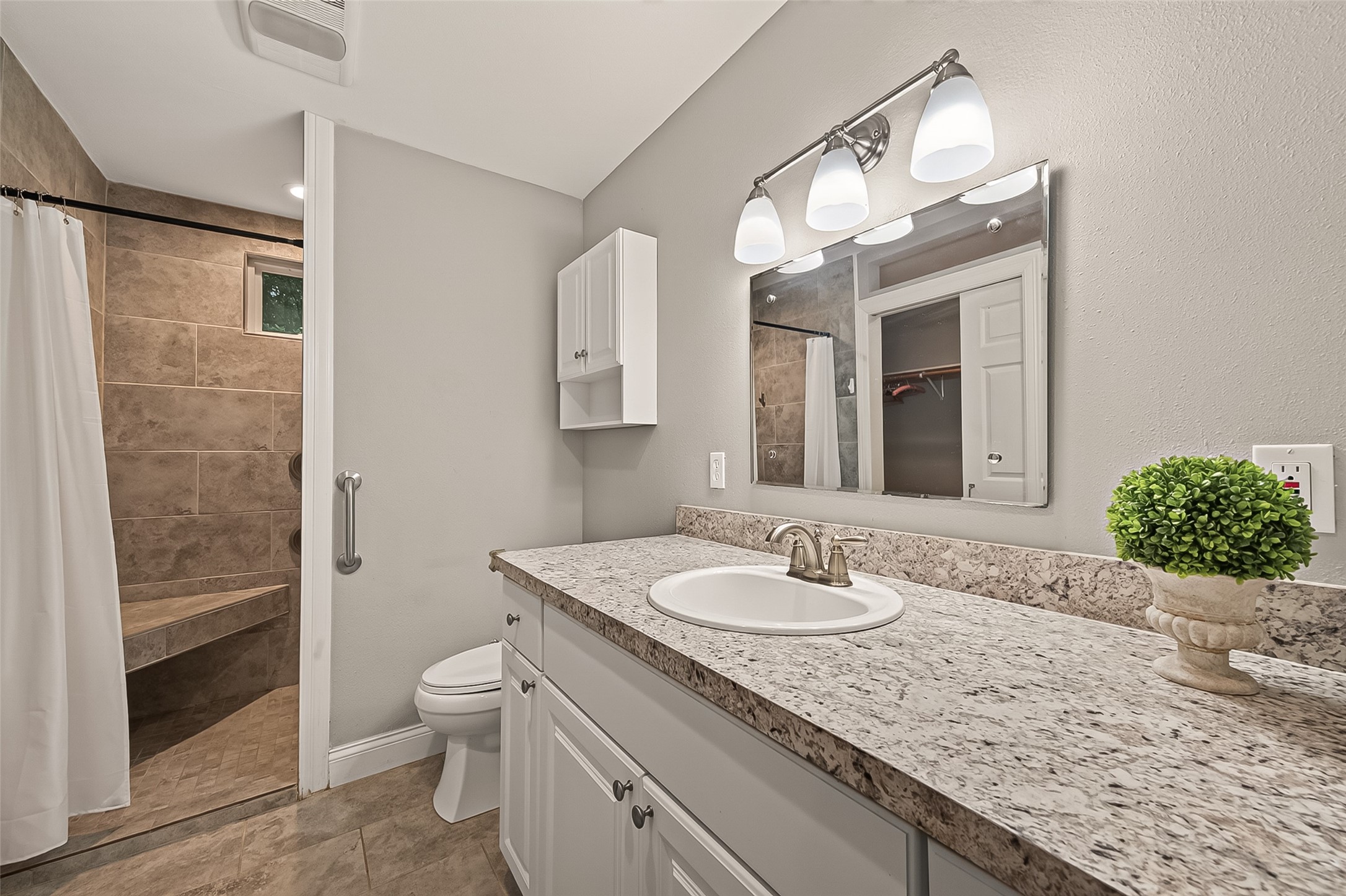 Full Bathroom with a large shower located in the Guest Qtrs