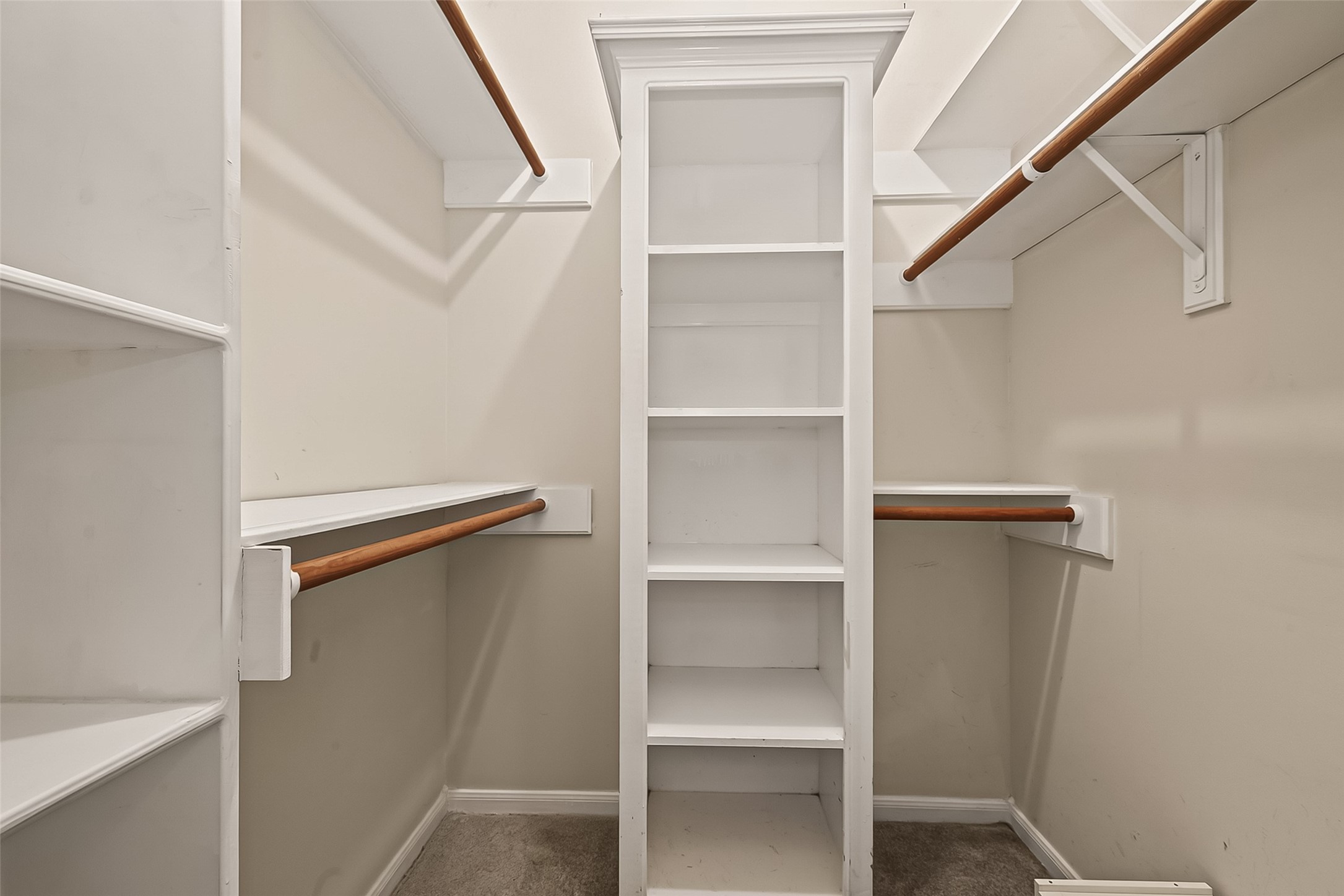 one of the two walk-in closets in the primary bathroom