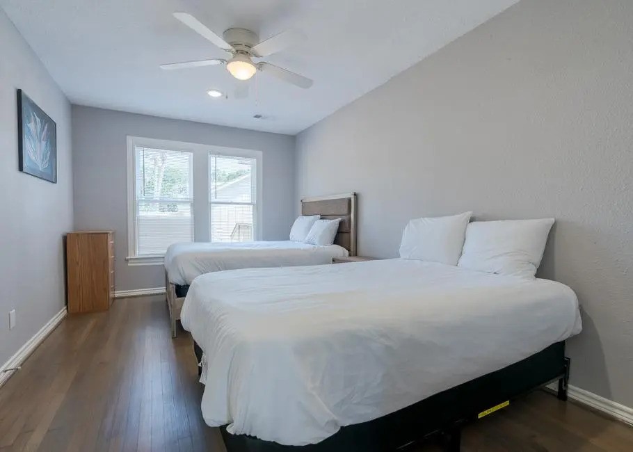 Bed is for staging, not for sale. Bedroom 2 different angle