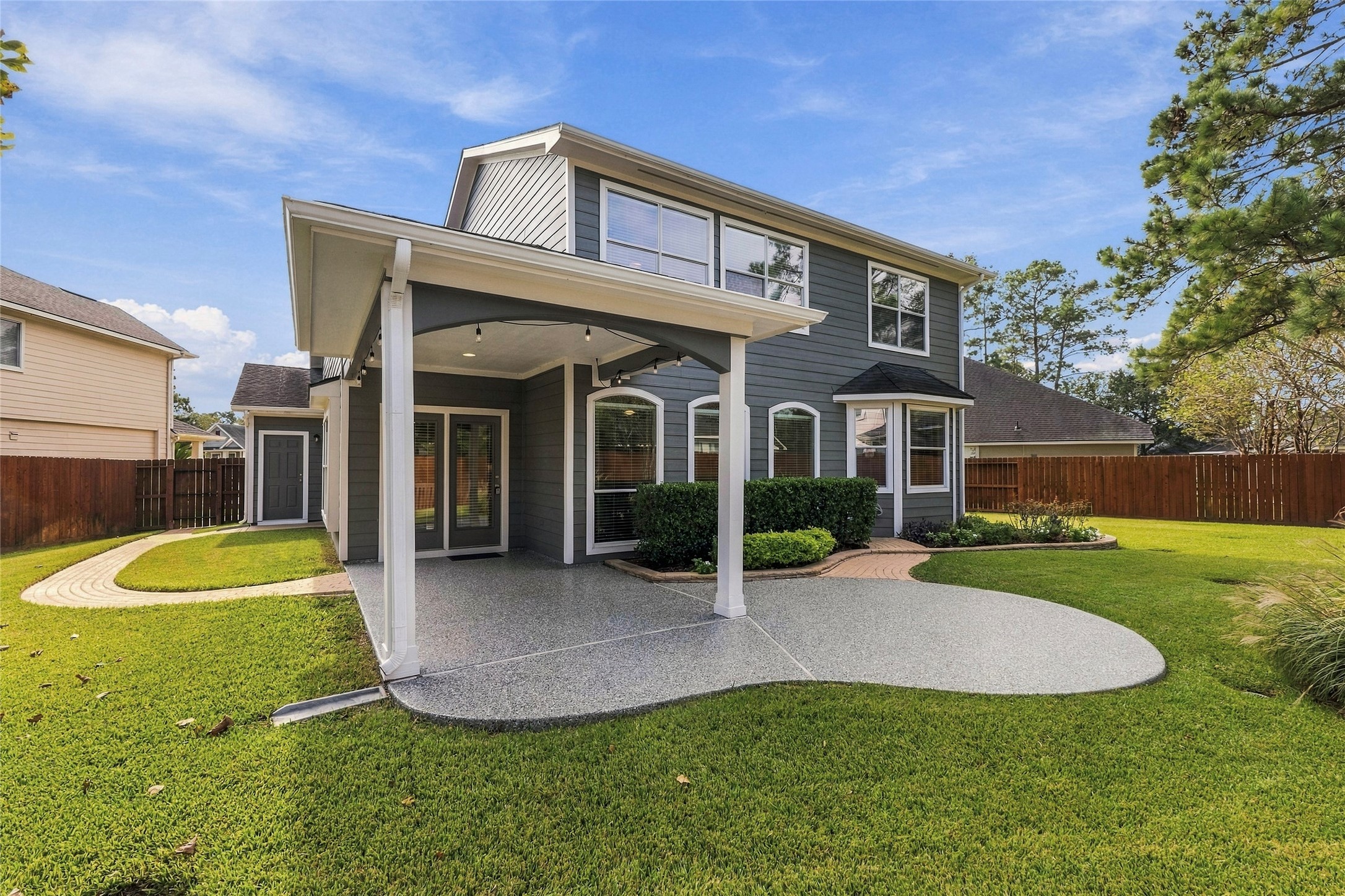 Enjoy a spacious covered patio with an extension and Epoxy coating.