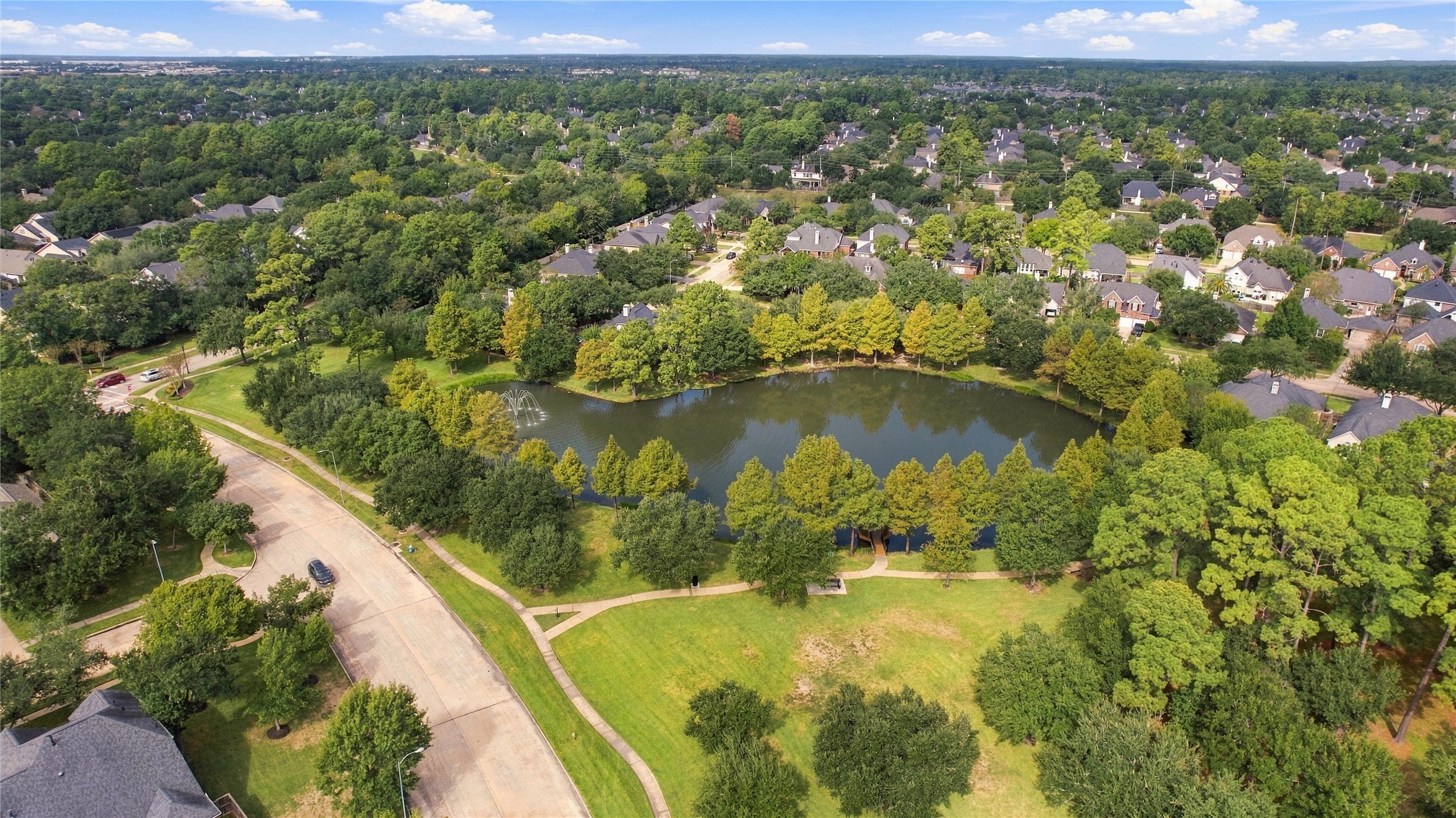 Home is close to one of several stocked fishing ponds in the community.