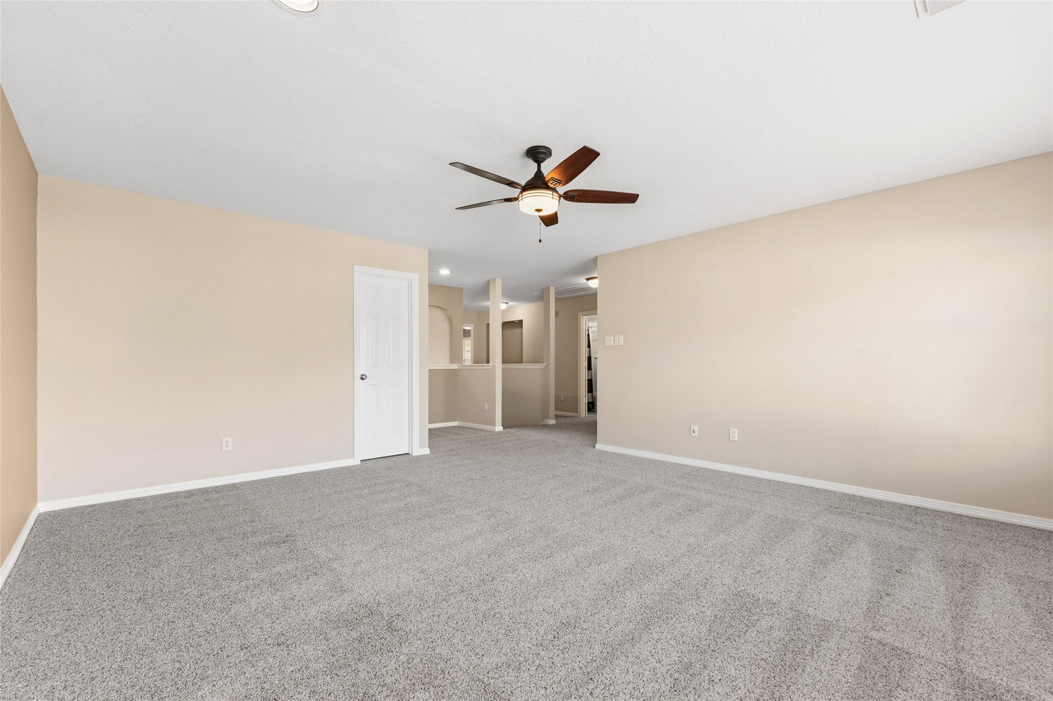 The game room has a great study or reading nook at the top of the stairs.