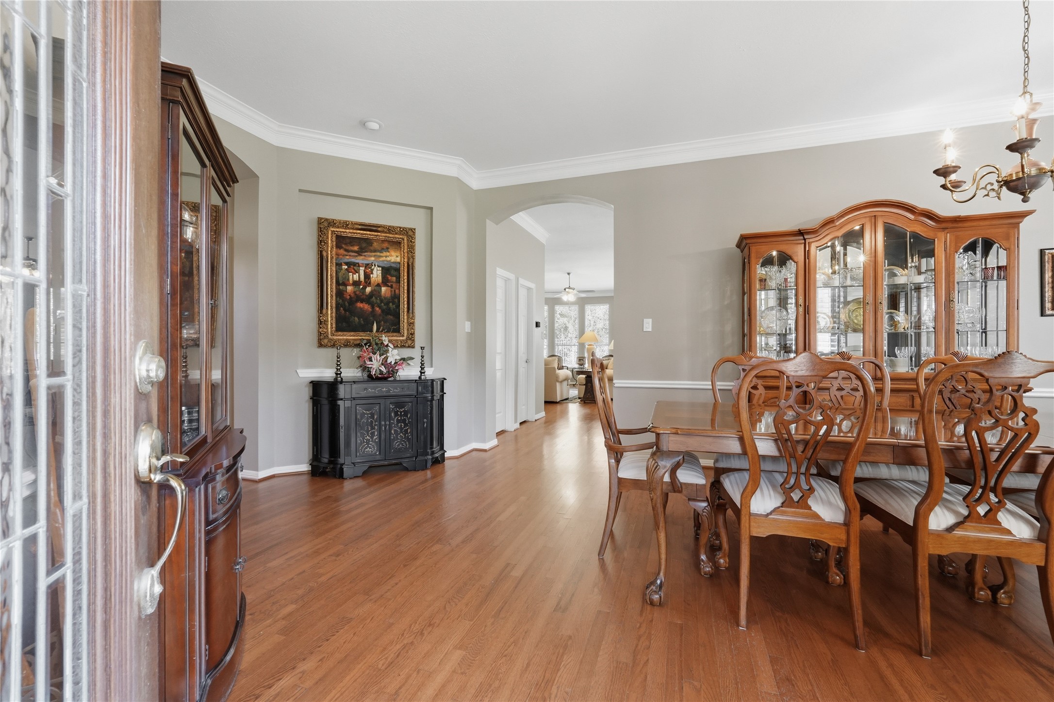 Step inside and notice the wood flooring and crown molding.