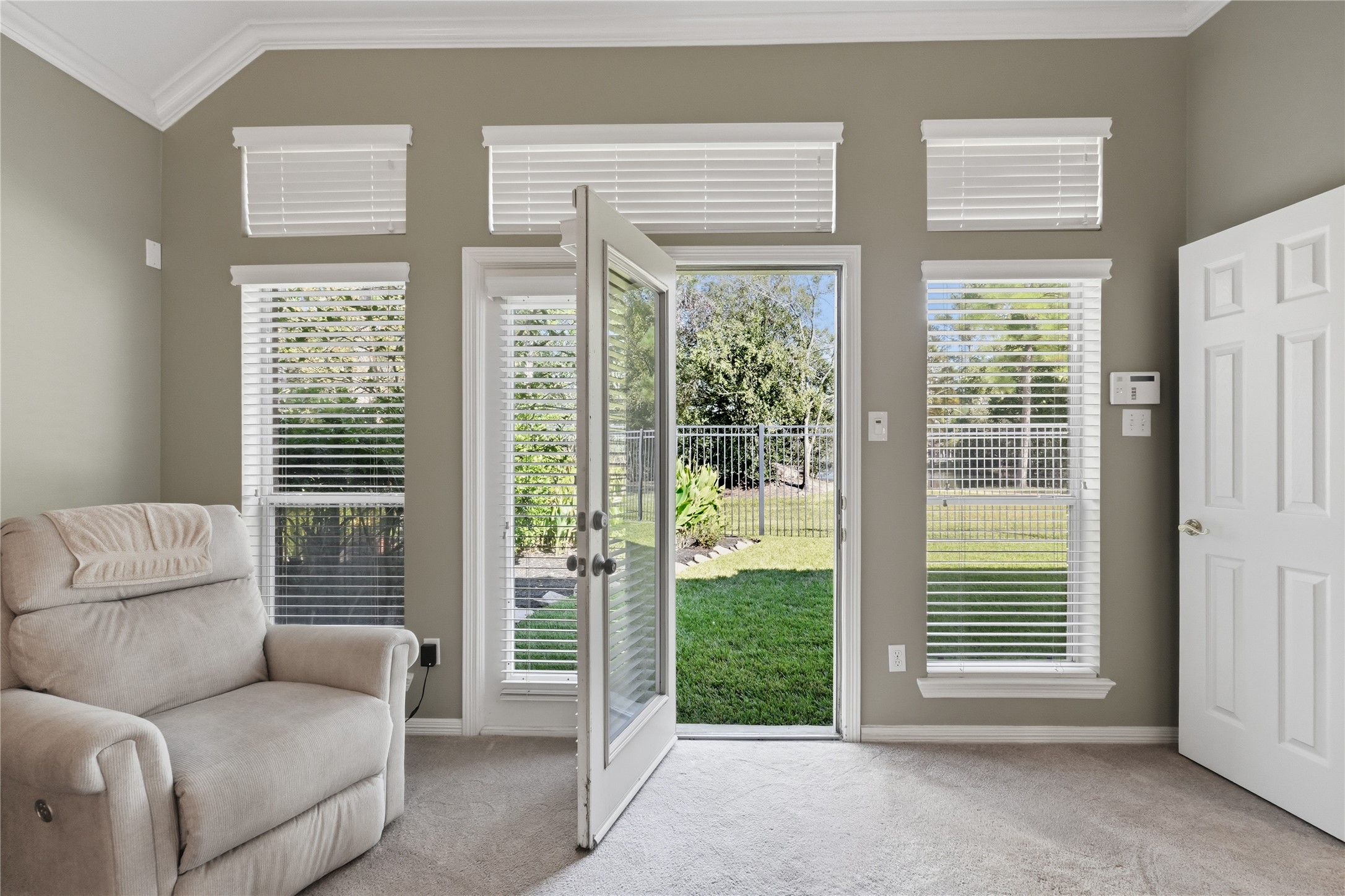 Direct access to the backyard from the primary bedroom.