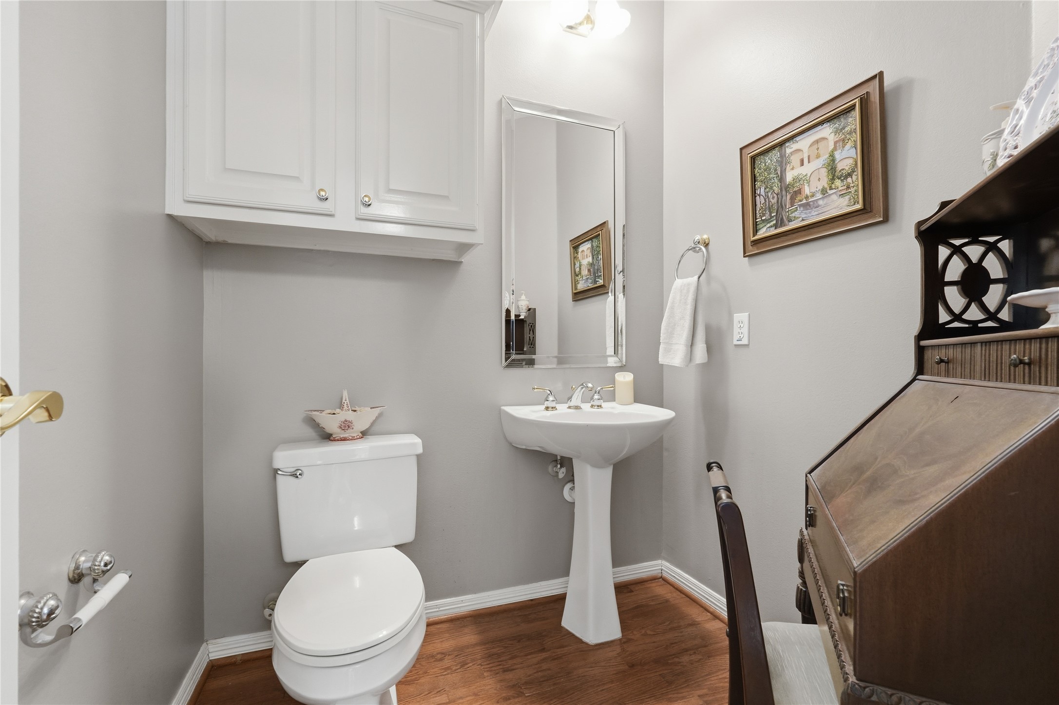 Half bath located across from the kitchen.