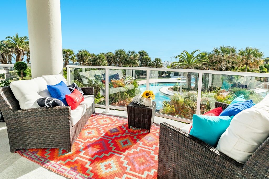 Large balcony overlooking the pools