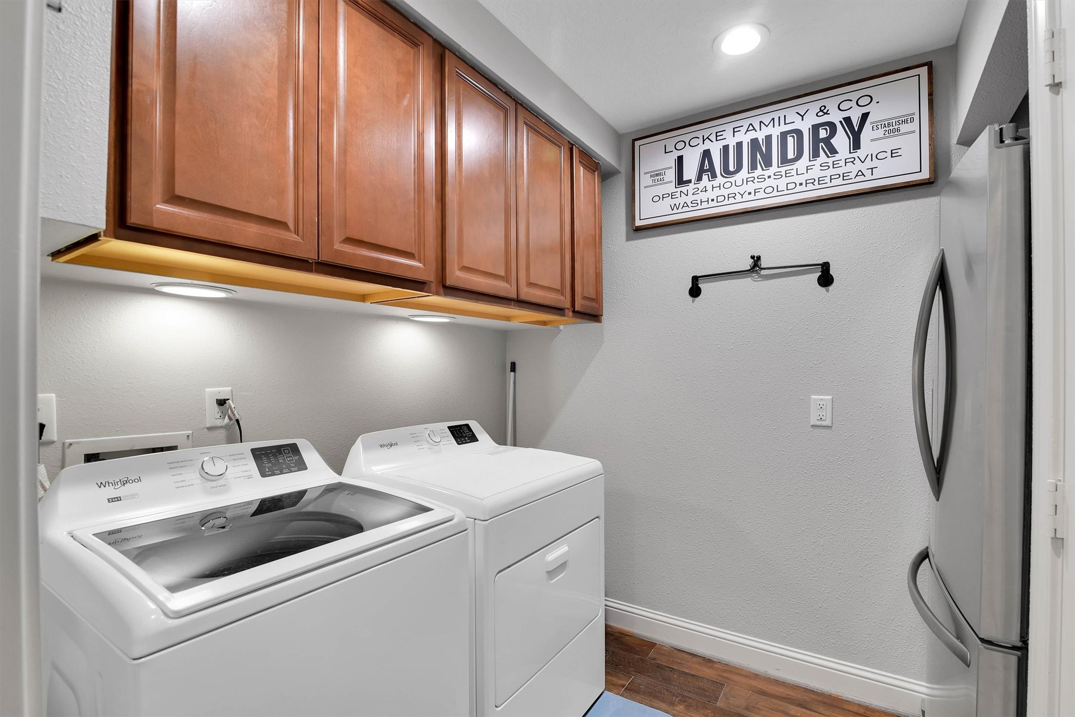 Laundry room with second fridge and storage closet. See 3-D tour for all the storage.