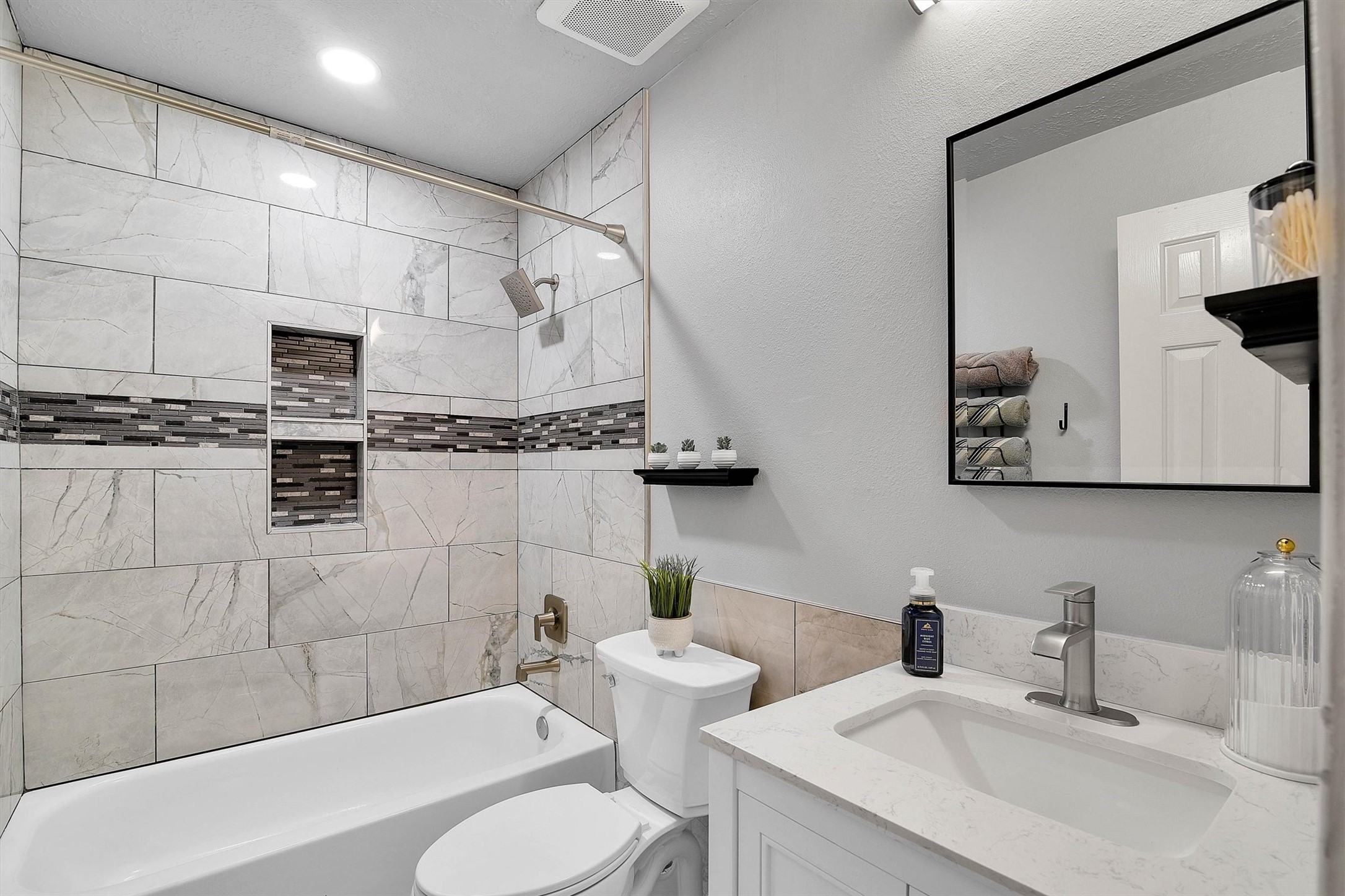 Full bath upstairs with upgraded shower and sink.