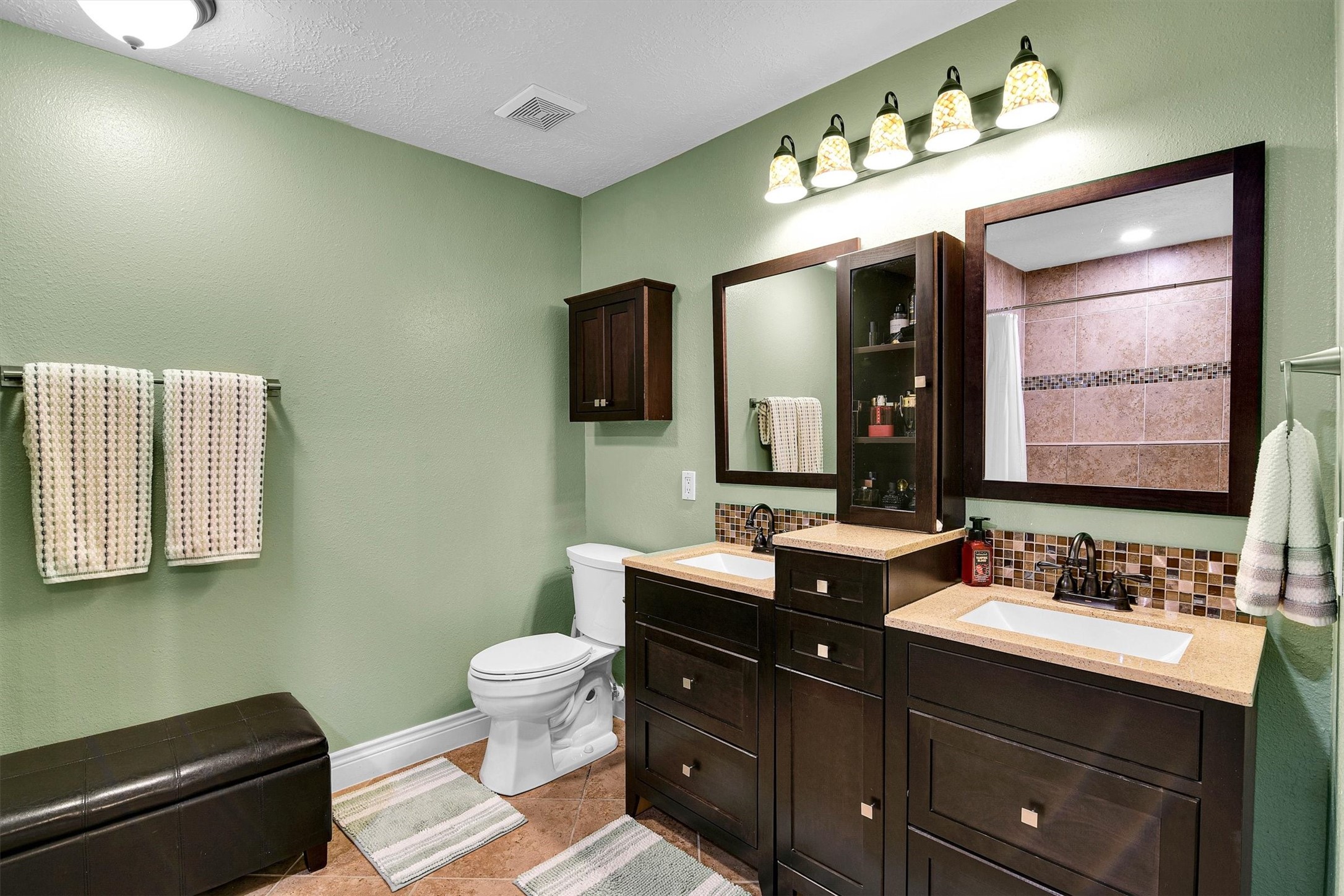 Double sink vanity in primary bath.
