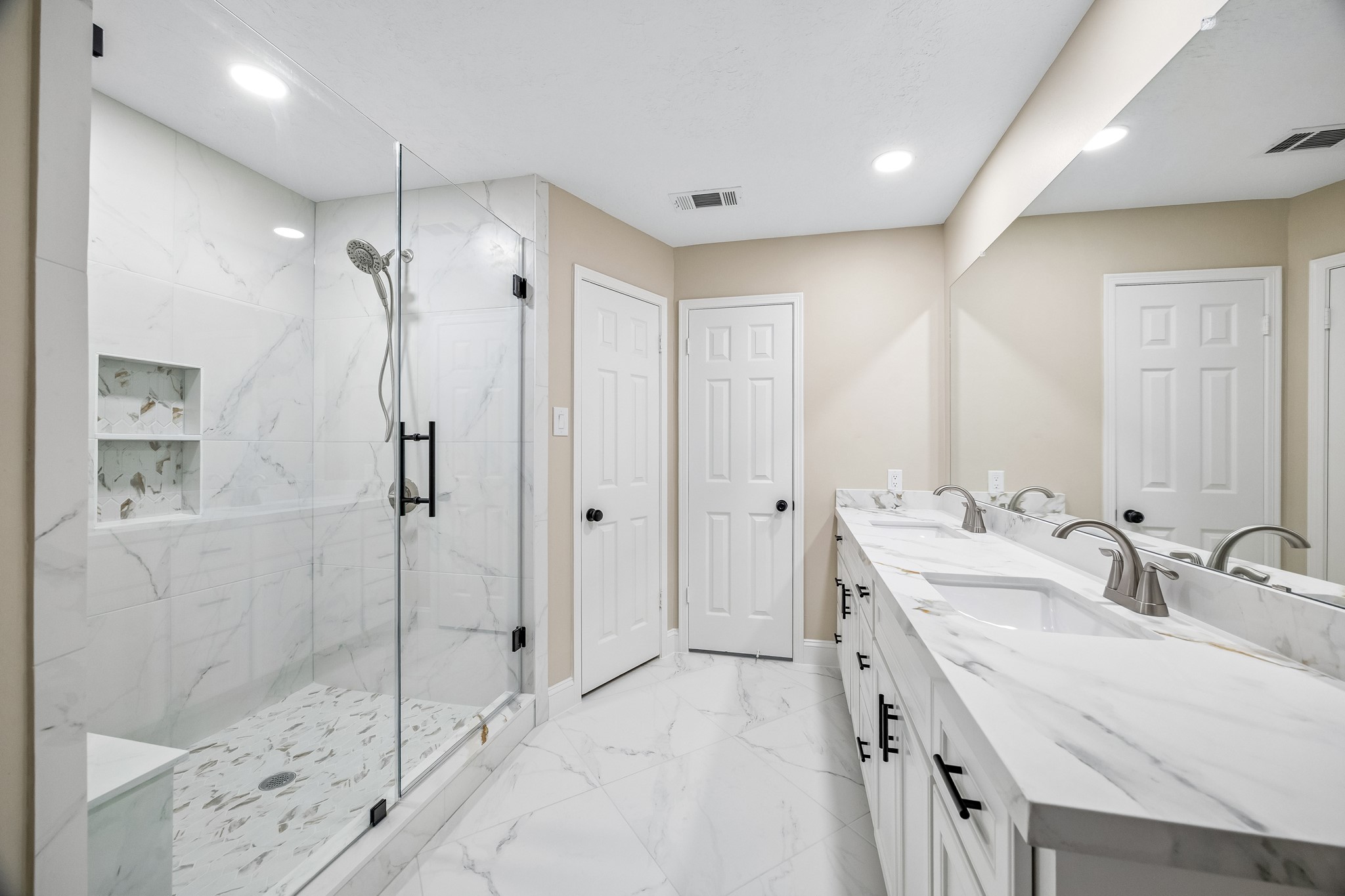 Completely remodeled bath.  Look at the quartz countertops
