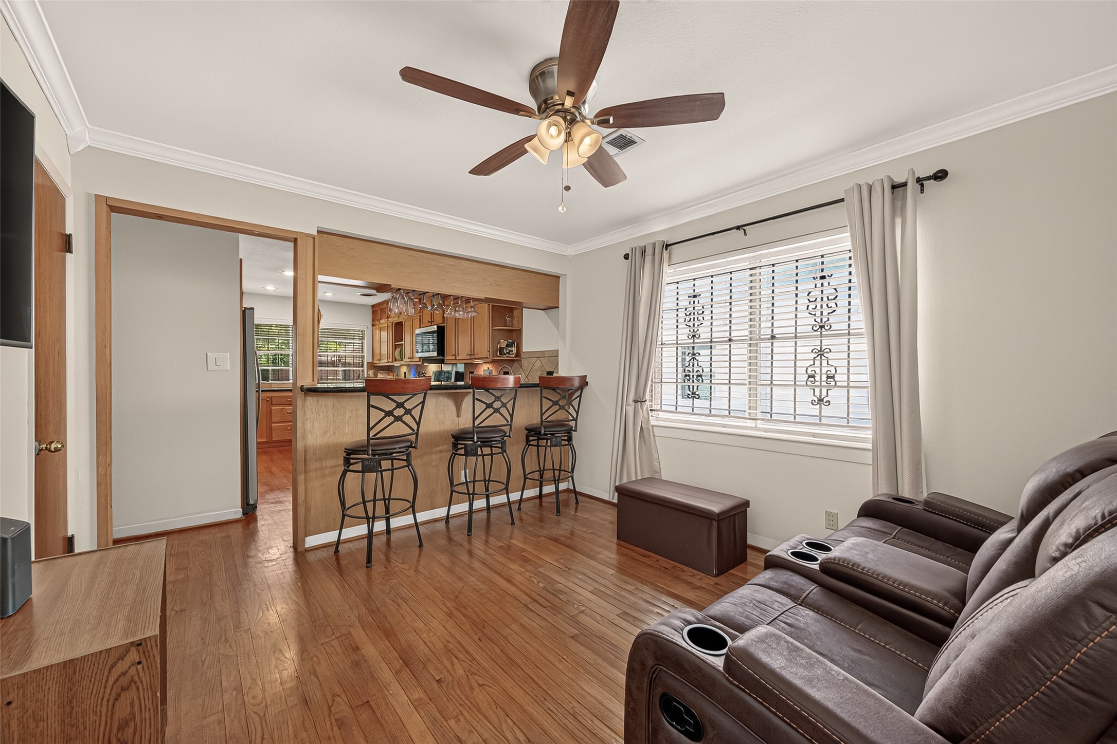 Flex Room used a TV Room, or a casual Breakfast Room with bar stool seating at granite kitchen counter.