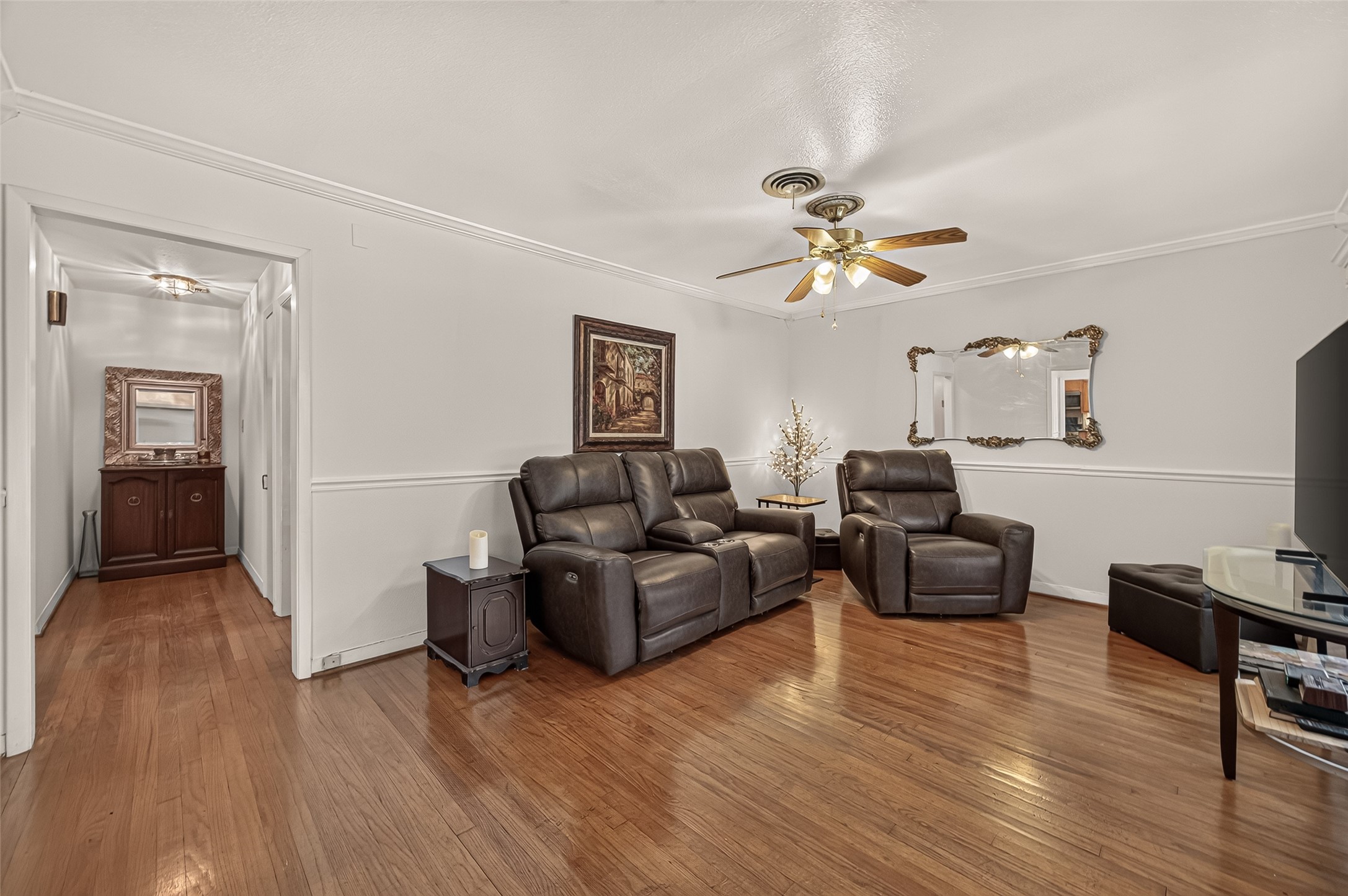 Spacious Living Room. Original hardwood floors.