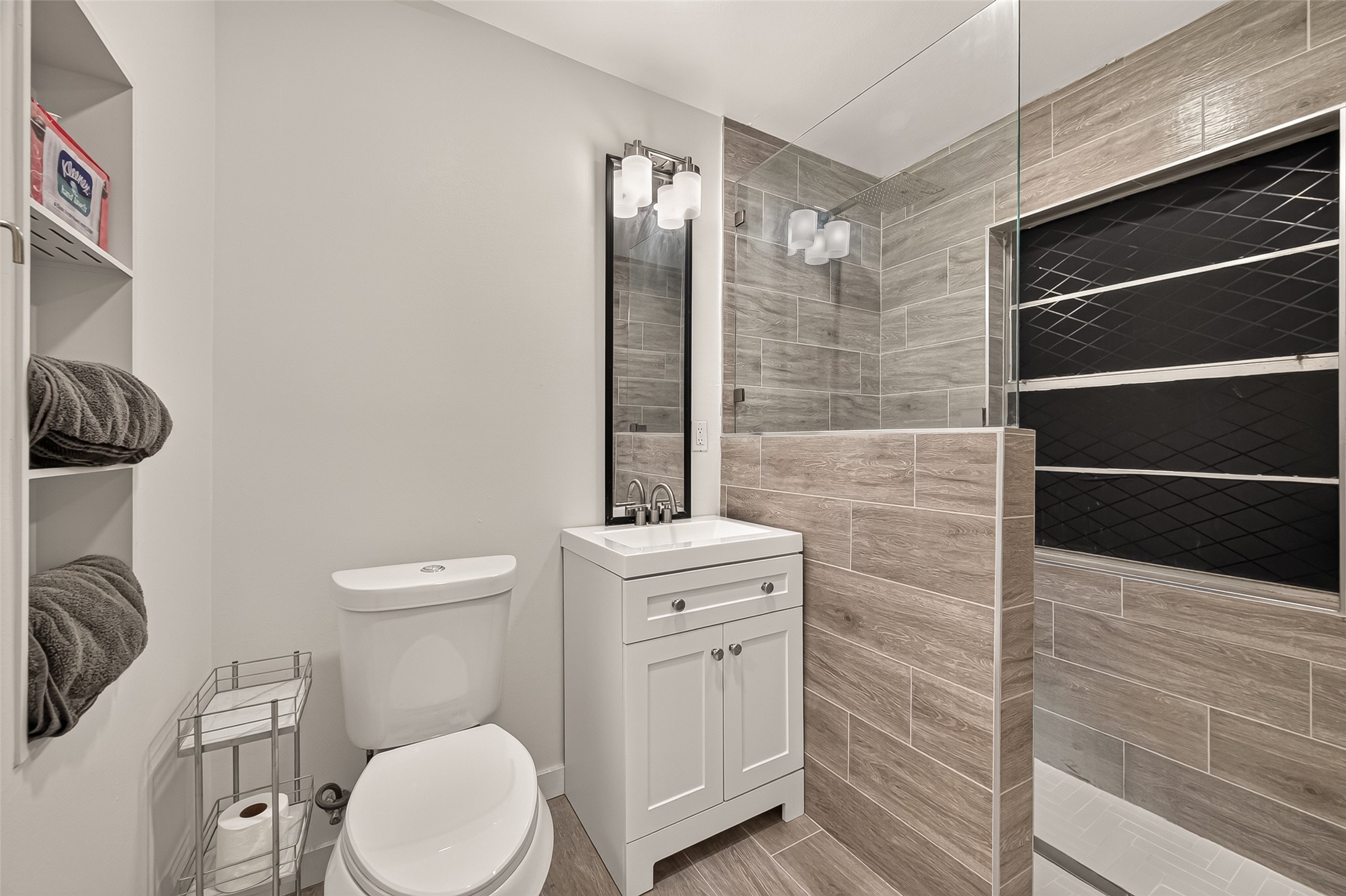 Recently updated bath. Walk in rain head shower. Shower is handicap accessible.