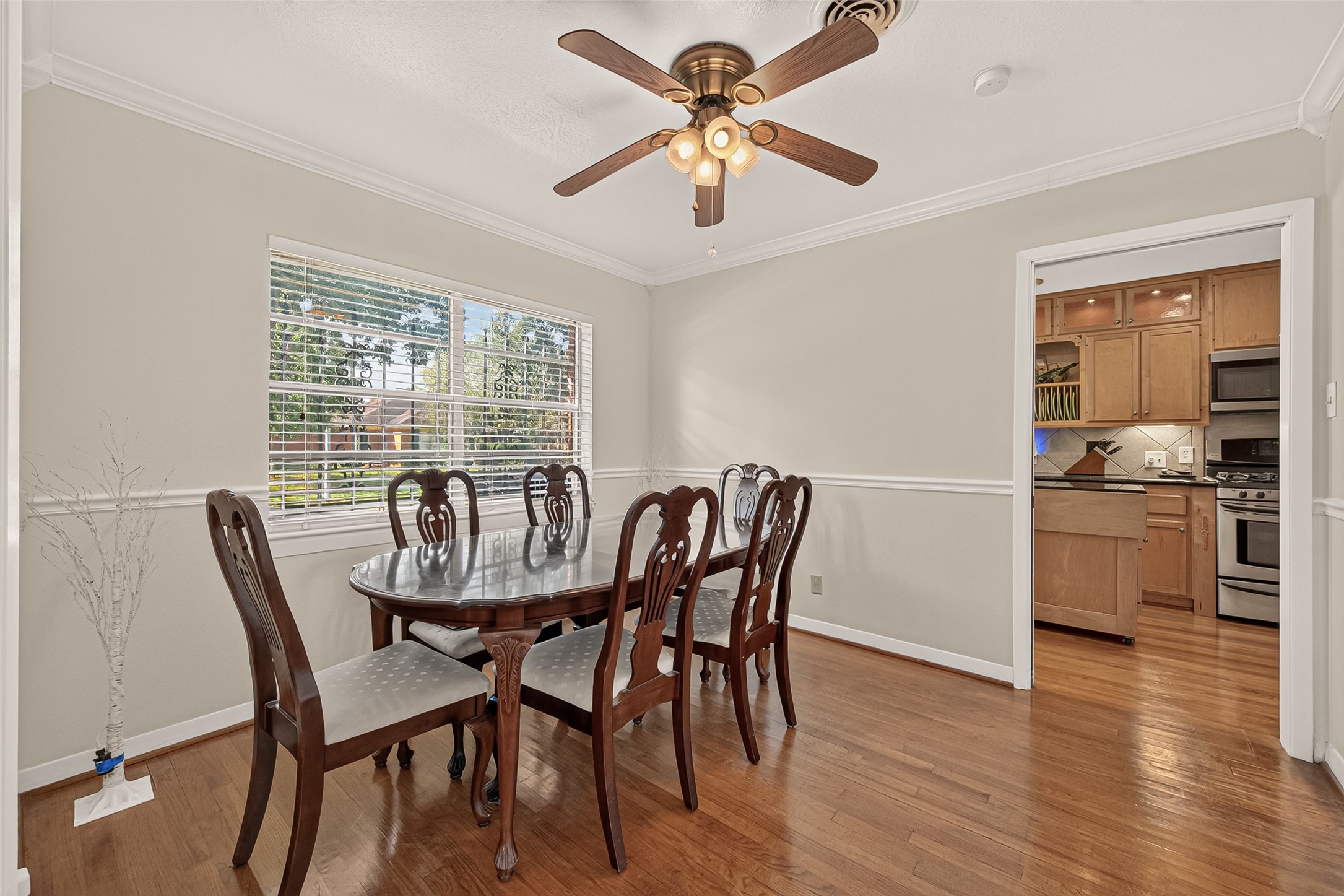 Dining Room, with chair rail molding and the original hardwood floors.